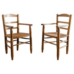 Pair of French Mid Century Dining Wooden Armchairs in Elm 
Straw Rattan, 1950s