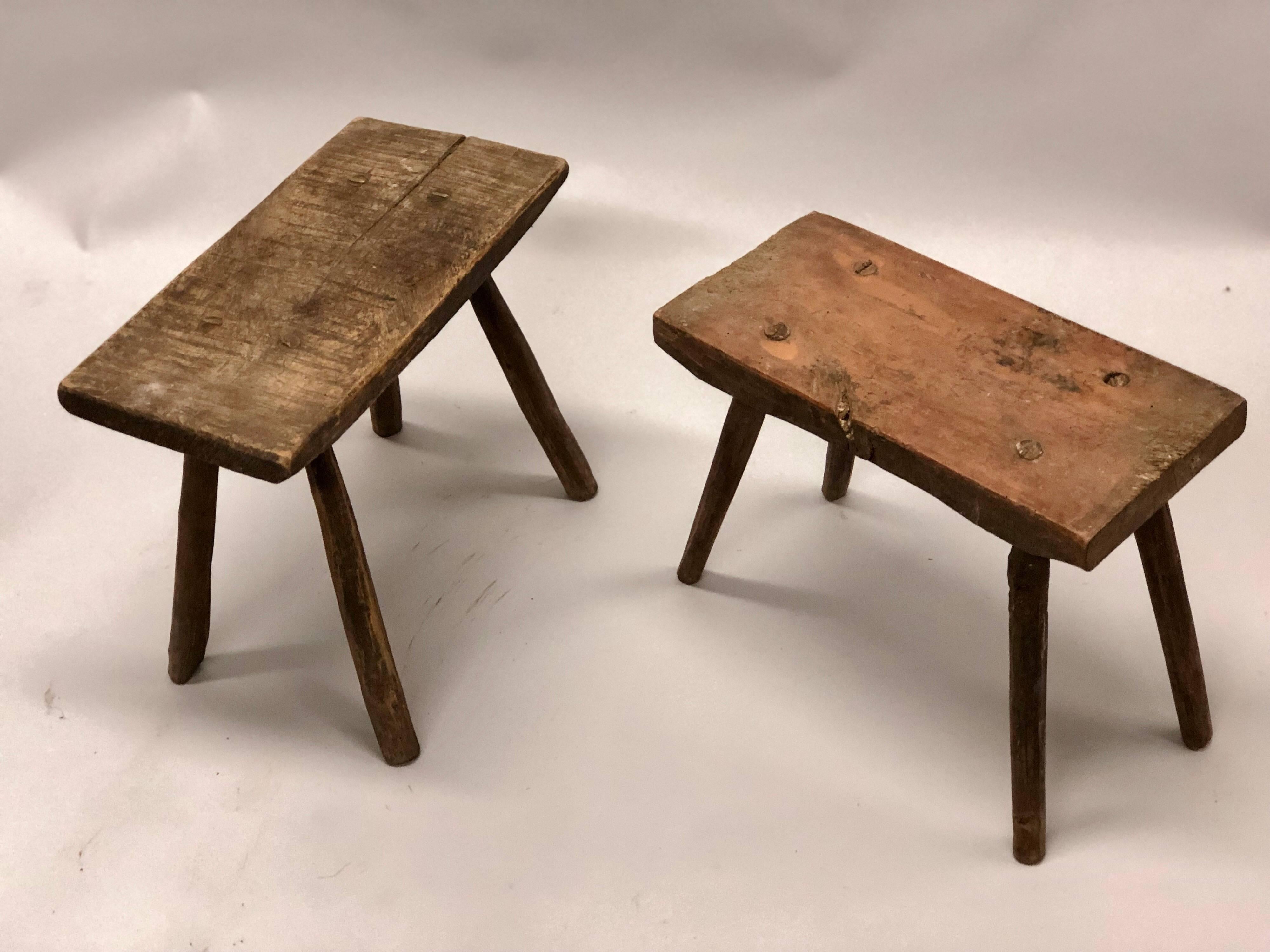 French midcentury rustic, Primitivist pair of carved wood benches, stools in the Brutalist or modern craftsman tradition.
 
One bench is slightly smaller than the other: H 13.5 x 17 x 7.83.