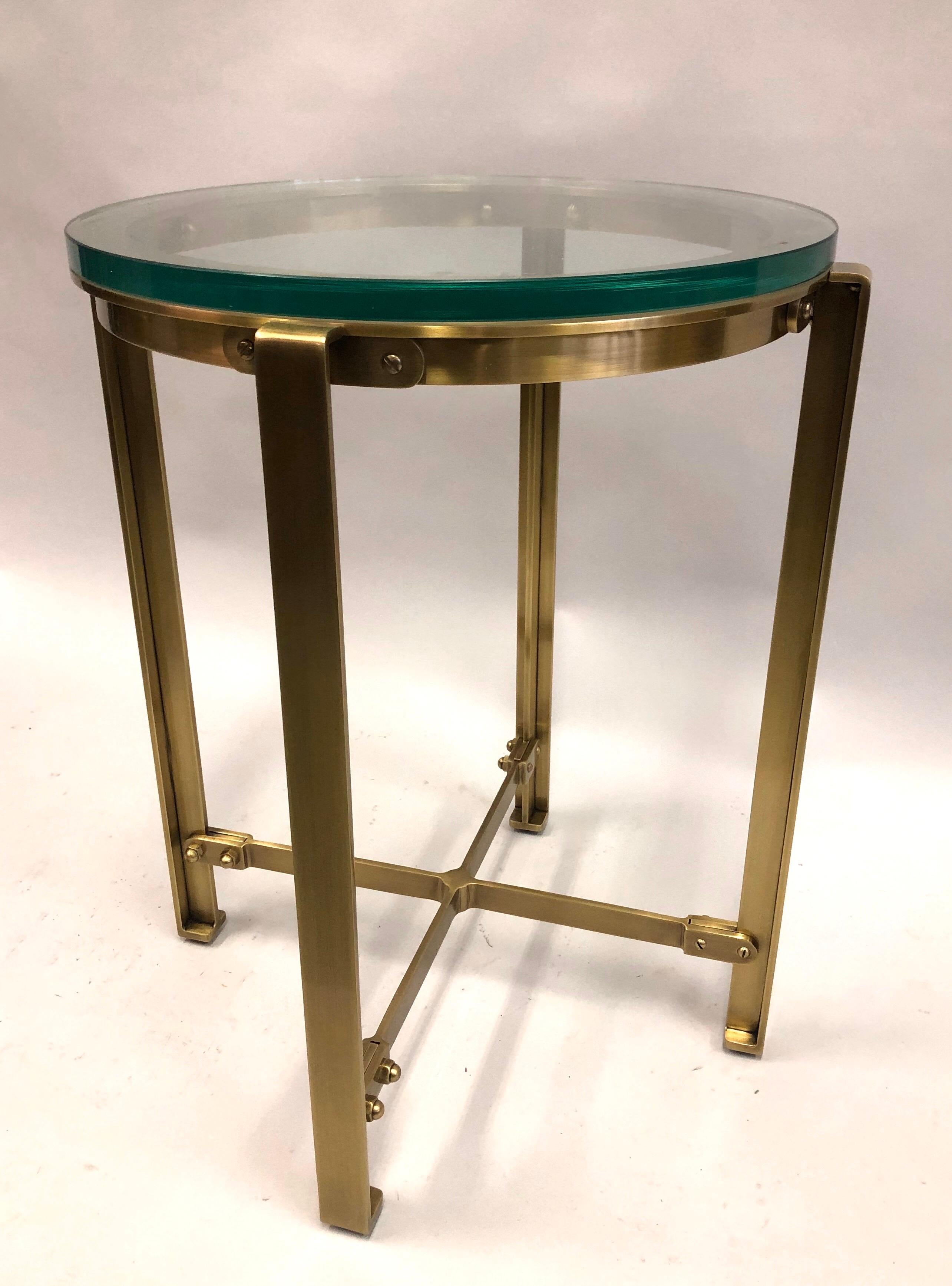Pair of French Mid-Century Modern style round antiqued solid brass side or end tables in the style of Jacques Quinet with thick 3/4