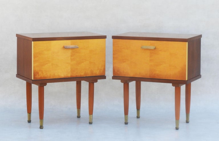 Two vintage Mid-Century bedside tables/nightstands or sofa side tables.
A dou of two-tone side cabinets with a single generous-sized cupboard, drop-down door, tapered legs and cloched feet.
Stylish and practical this pair of side cabinets will work