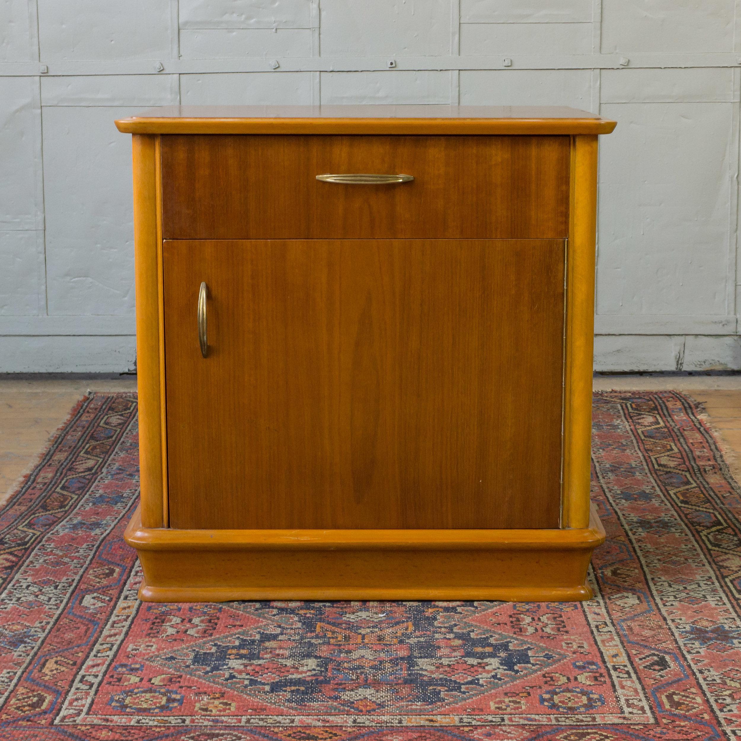 Handsome pair of French midcentury mahogany veneered nightstands that have a drawer and door with original hardware. Very good condition, recently restored.
