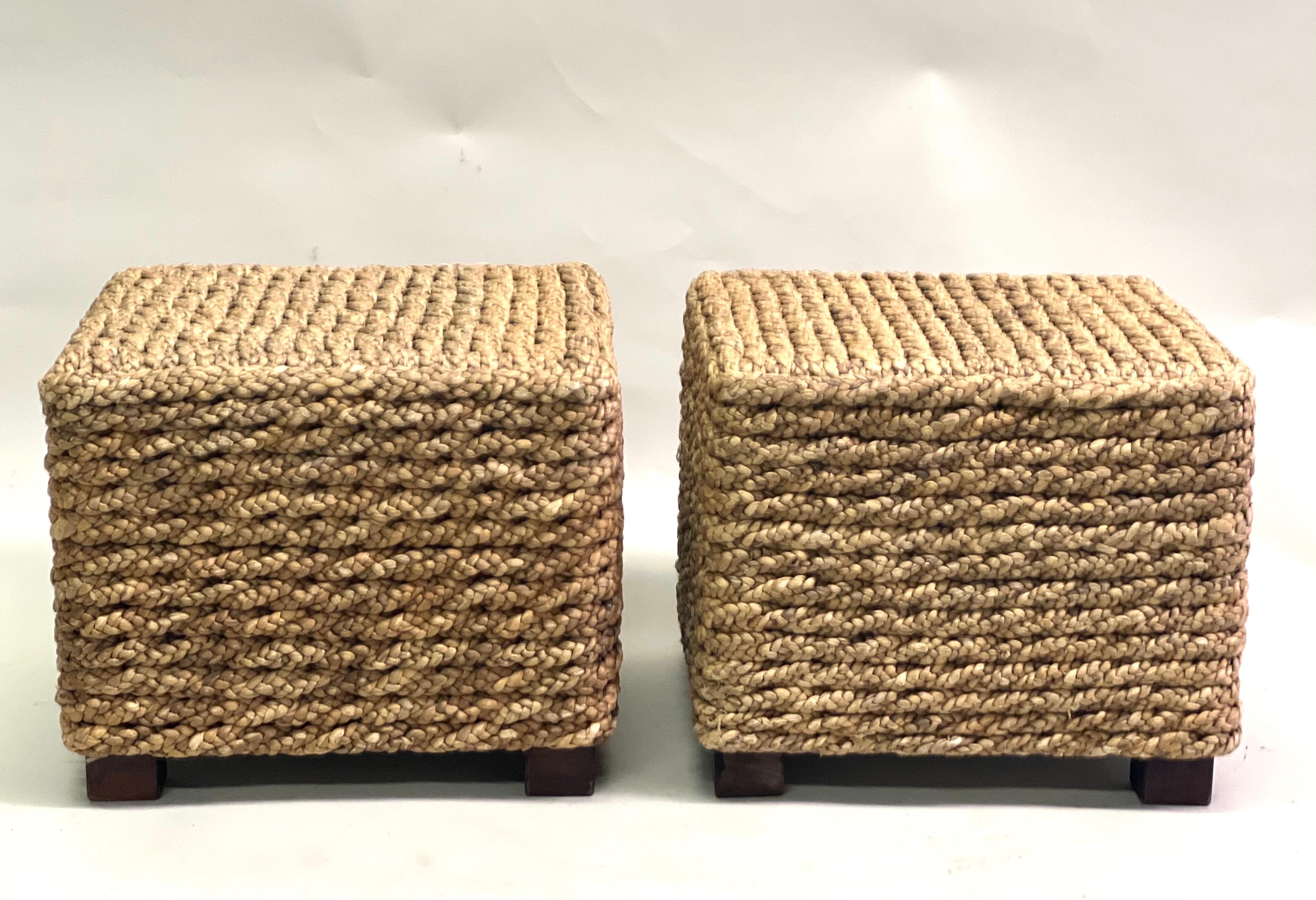 Elegant, Timeless Pair of French Mid-Century Modern Stools, Ottomans or Benches Hand-crafted and hand-knotted in Rope by Adrien Audoux and Frida Minet, France, circa 1960-1970. These modern craftsman pieces are carefully designed and constructed
