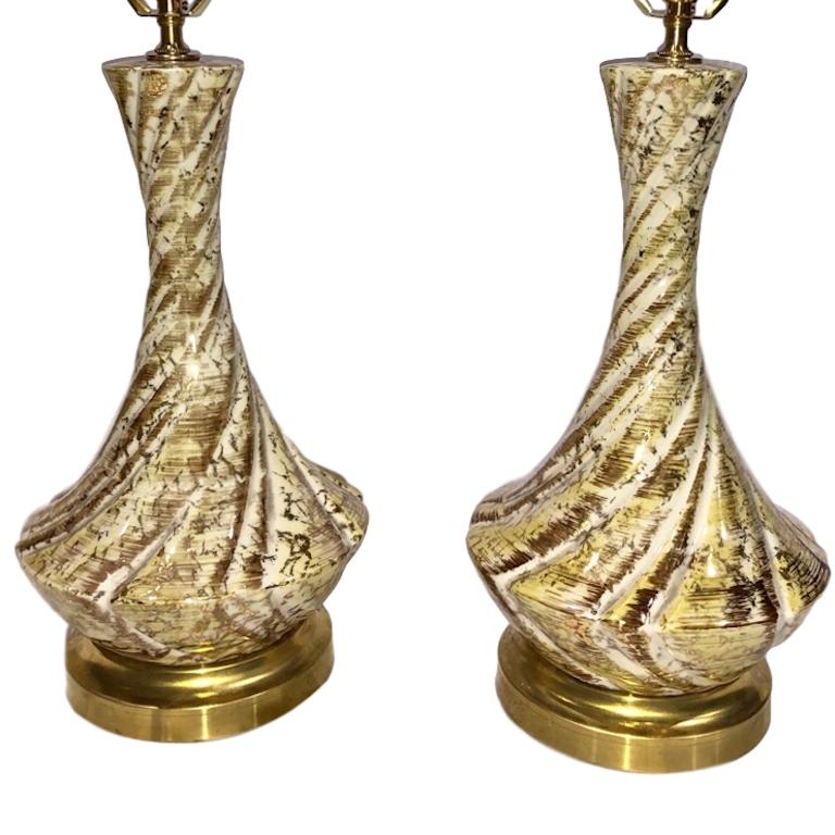 Pair of French circa 1960s yellow and gold glazed porcelain table lamps.

Measurements:
Height of body 16