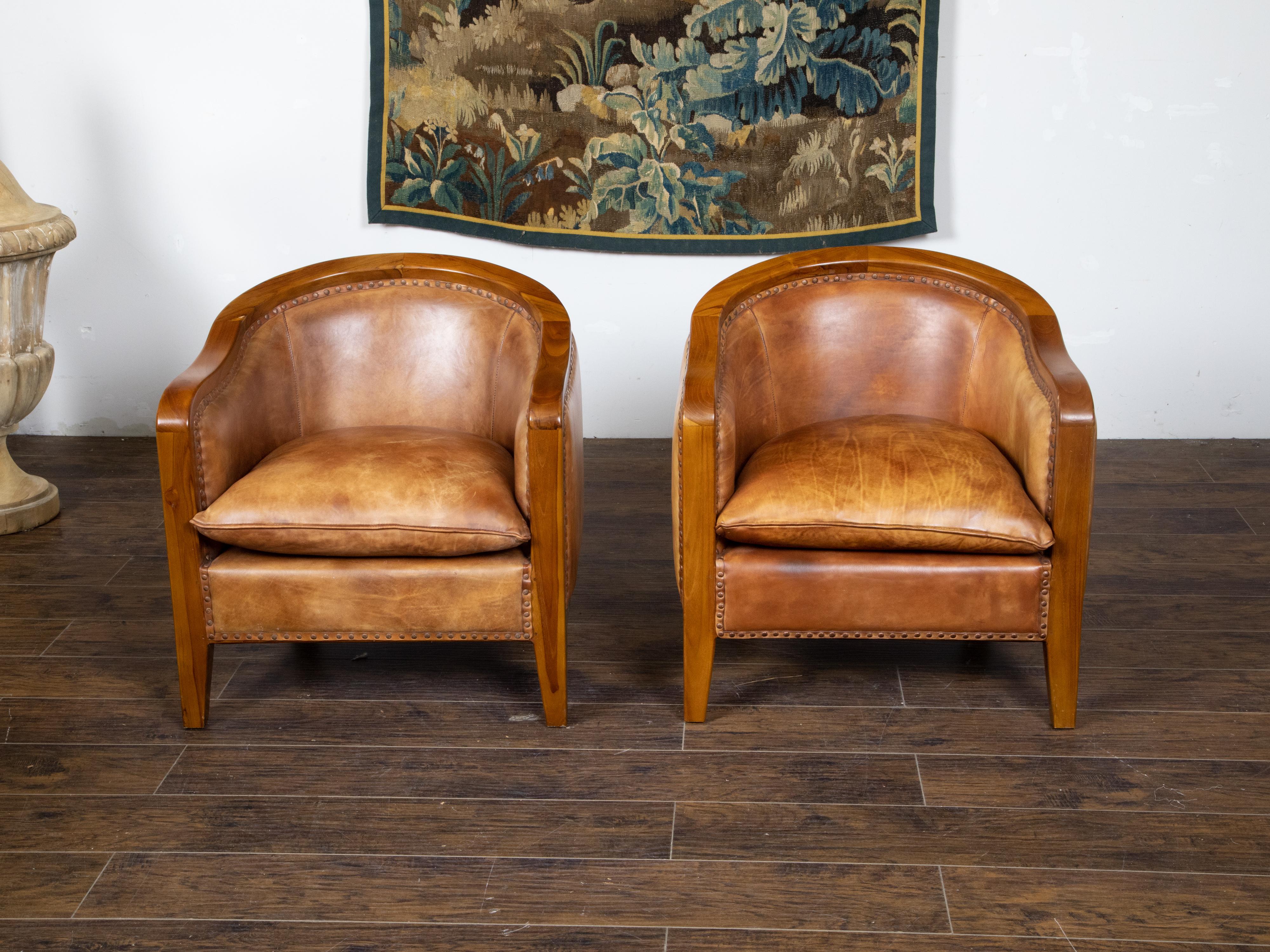 small brown leather chairs
