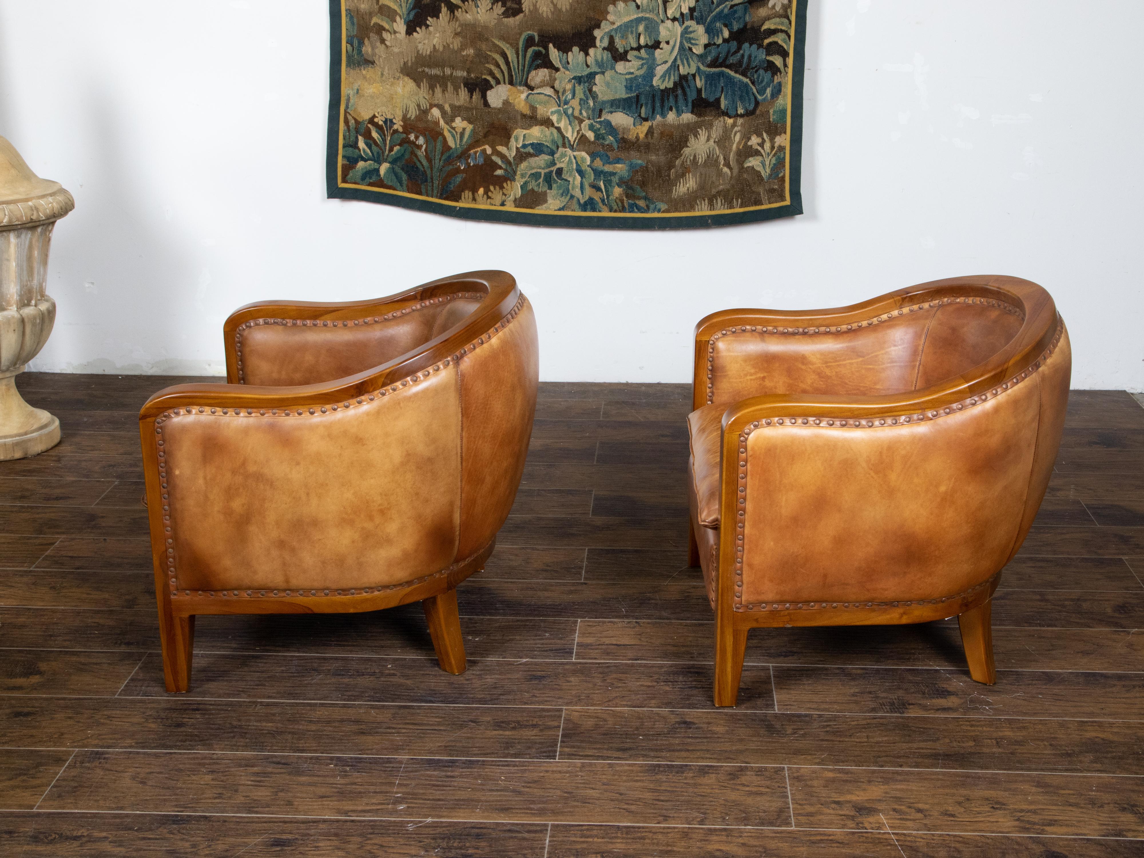 Brass Pair of French Midcentury Brown Leather Horseshoe Club Chairs with Nailheads