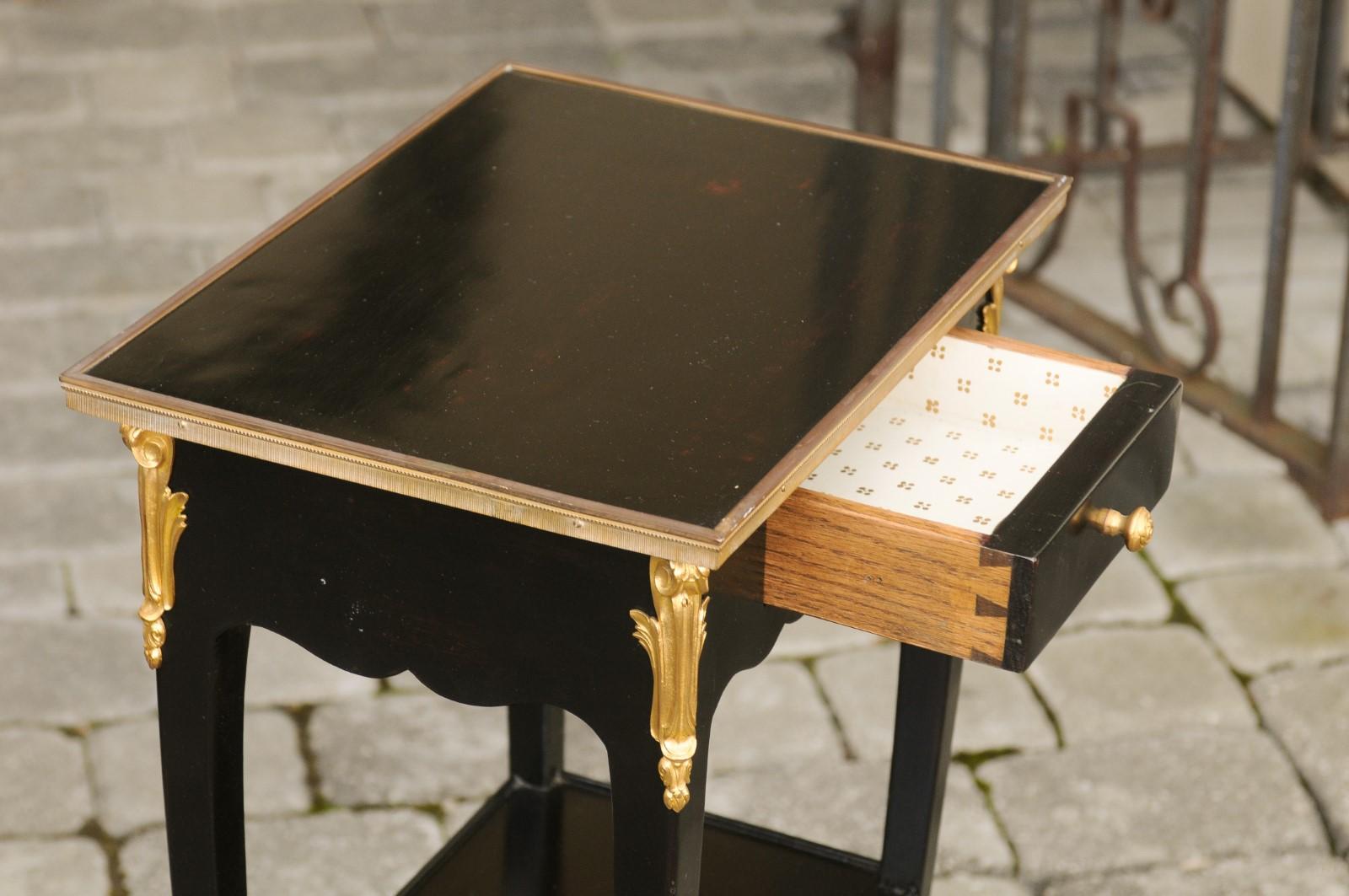 Pair of French Midcentury Ebonized Tables with Ormolu Mounts, Drawer and Shelf For Sale 6