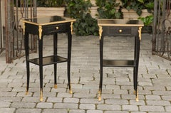 Pair of French Midcentury Ebonized Tables with Ormolu Mounts, Drawer and Shelf