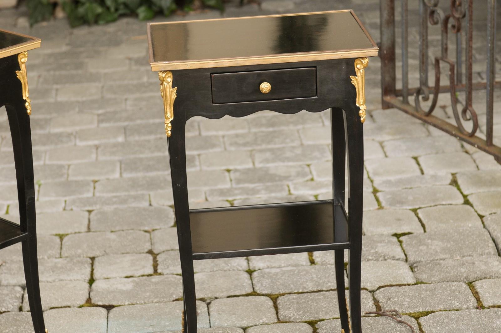 Pair of French Midcentury Ebonized Tables with Ormolu Mounts, Drawer and Shelf For Sale 2