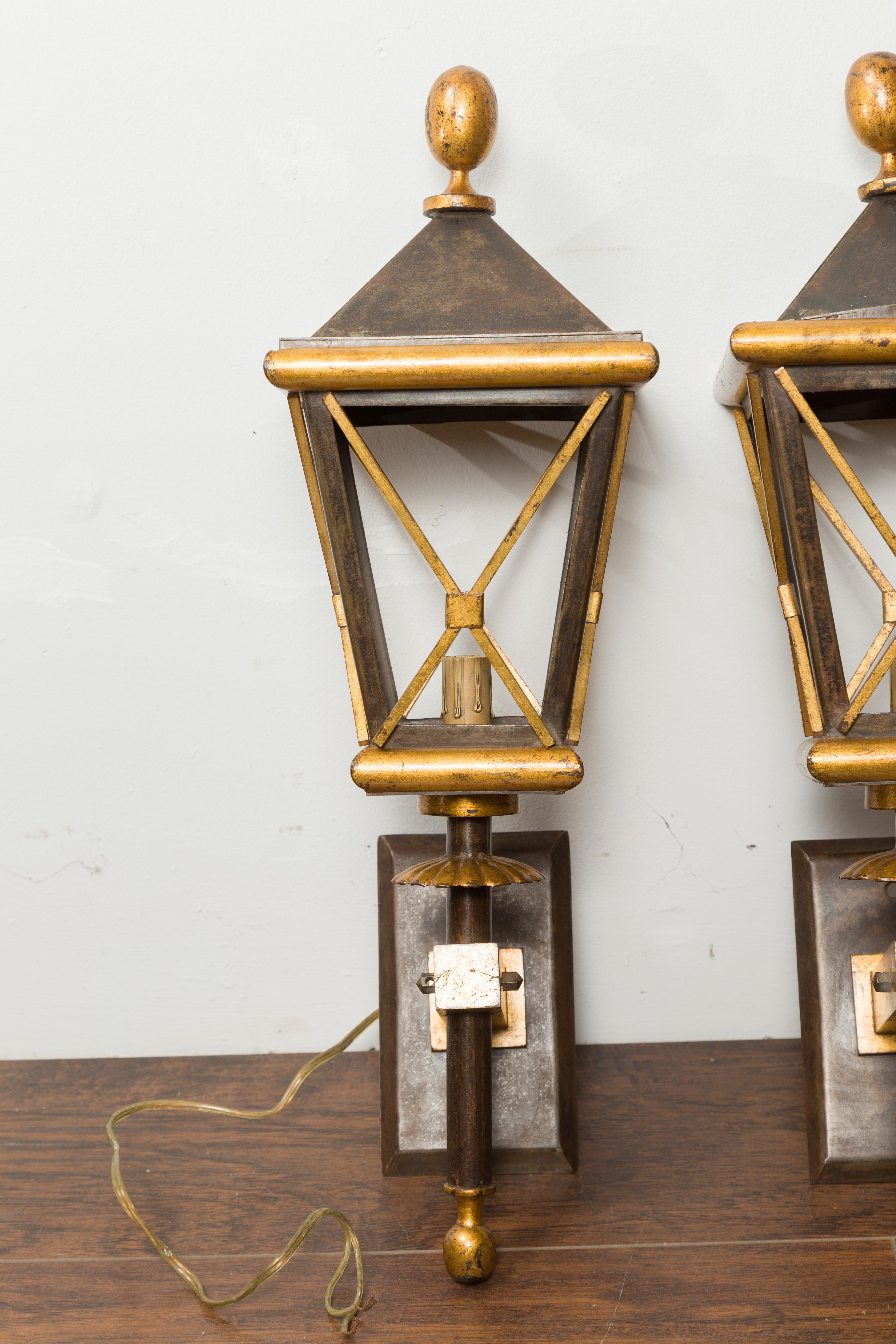 Mid-Century Modern Pair of French Midcentury Gilt Iron Wall Mounted Lanterns with Single Lights For Sale