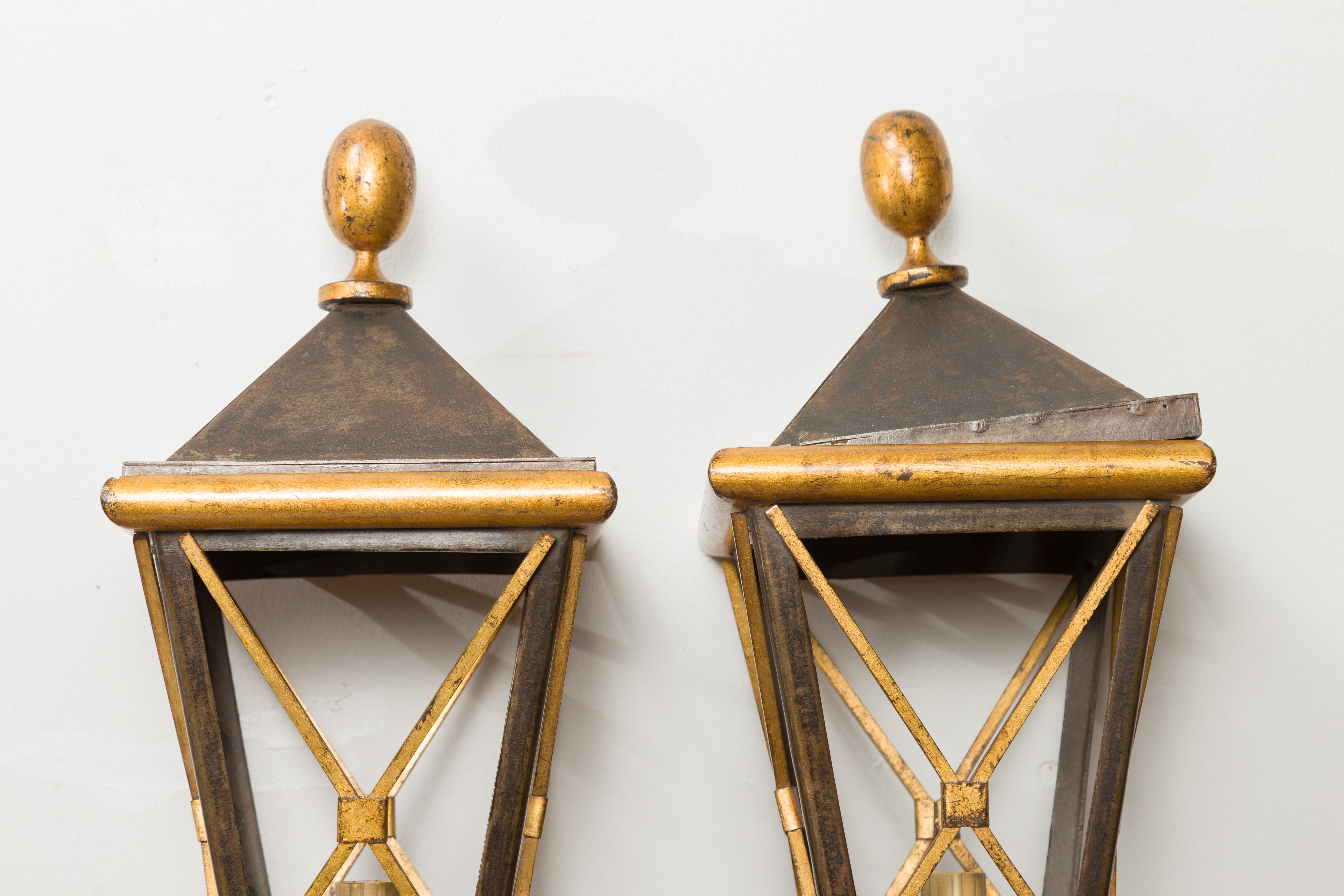 20th Century Pair of French Midcentury Gilt Iron Wall Mounted Lanterns with Single Lights For Sale