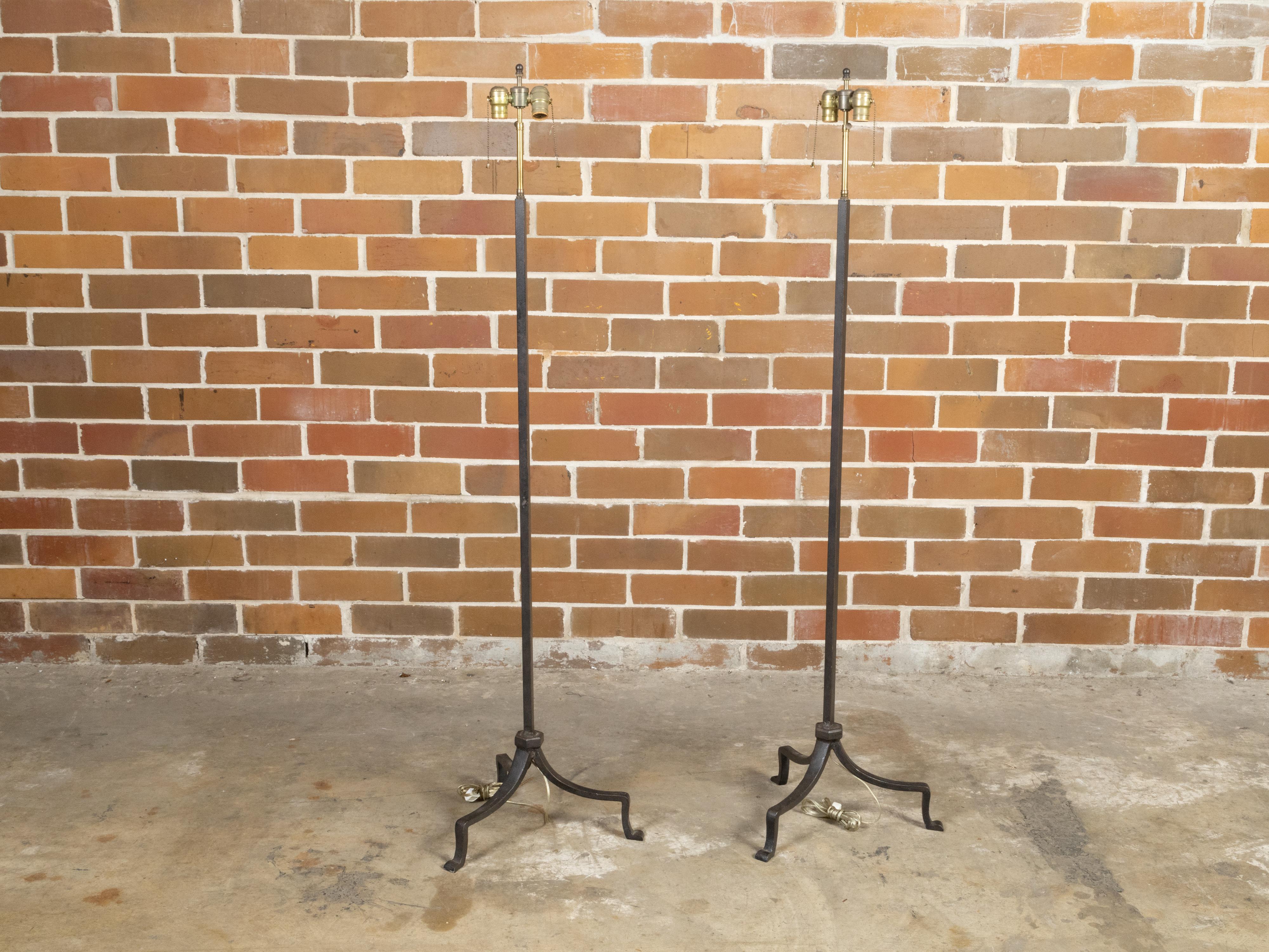Mid-Century Modern Pair of French Midcentury Iron Two-Light Floor Lamps with Tripod Bases