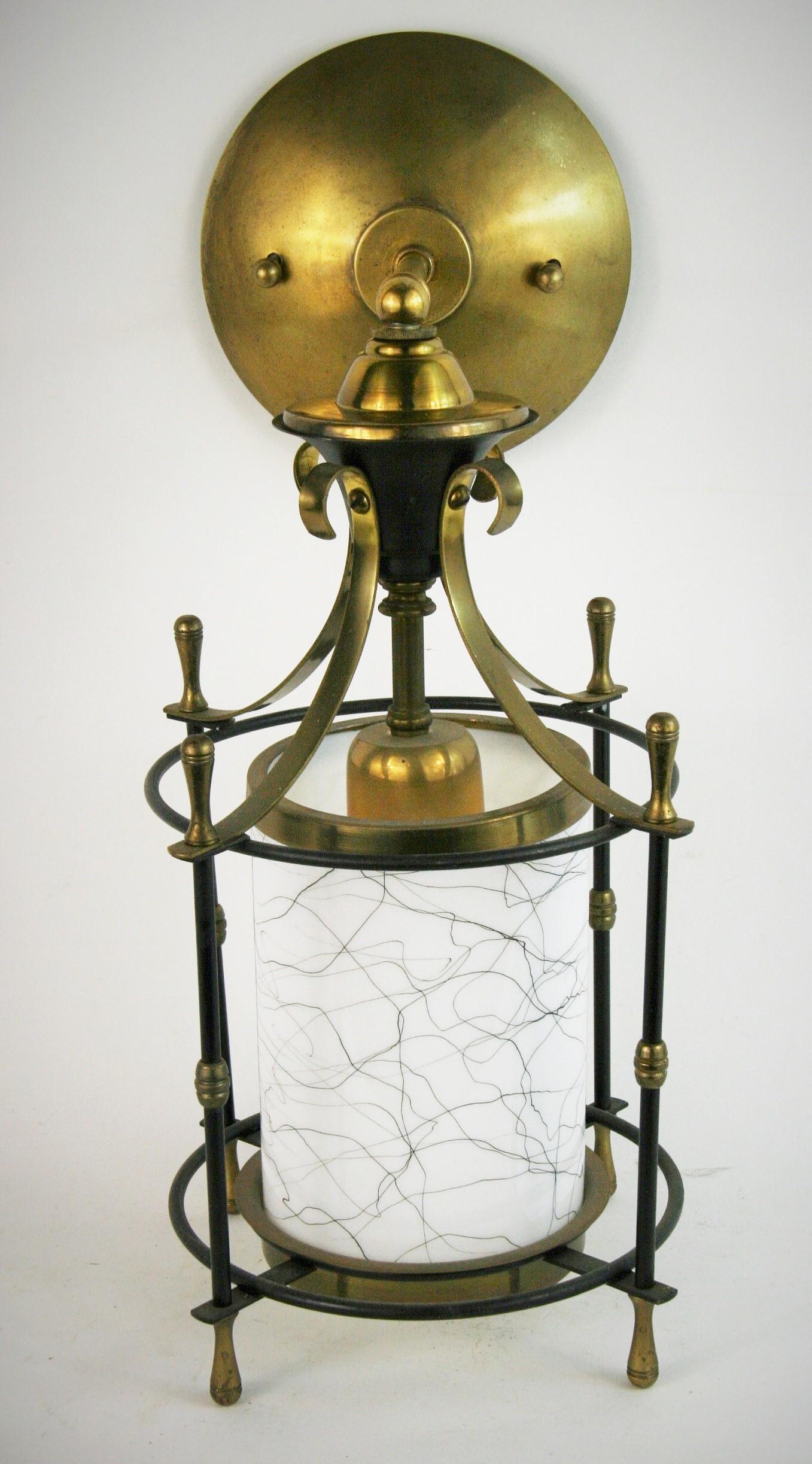 1589 French midcentury lantern wall sconces with glass shades with swirly black lines.
Rewired
60 watt Edison bulb.
