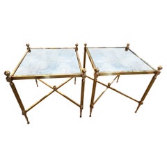 Paire de tables d'appoint basses à un seul niveau, en verre églomisé, datant du milieu du siècle dernier