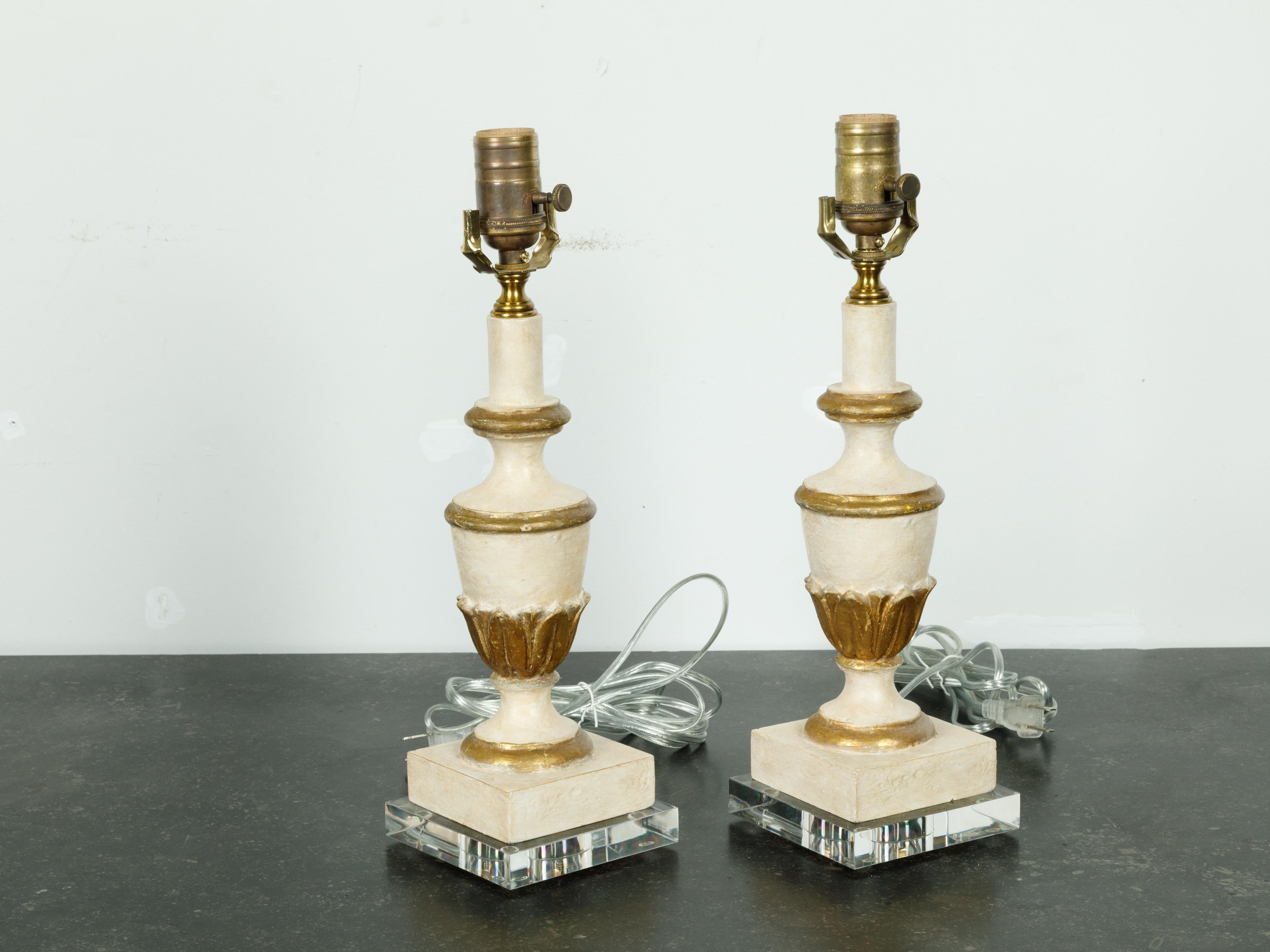 Pair of French Midcentury Painted and Gilt Carved Urn Table Lamps on Lucite In Good Condition In Atlanta, GA