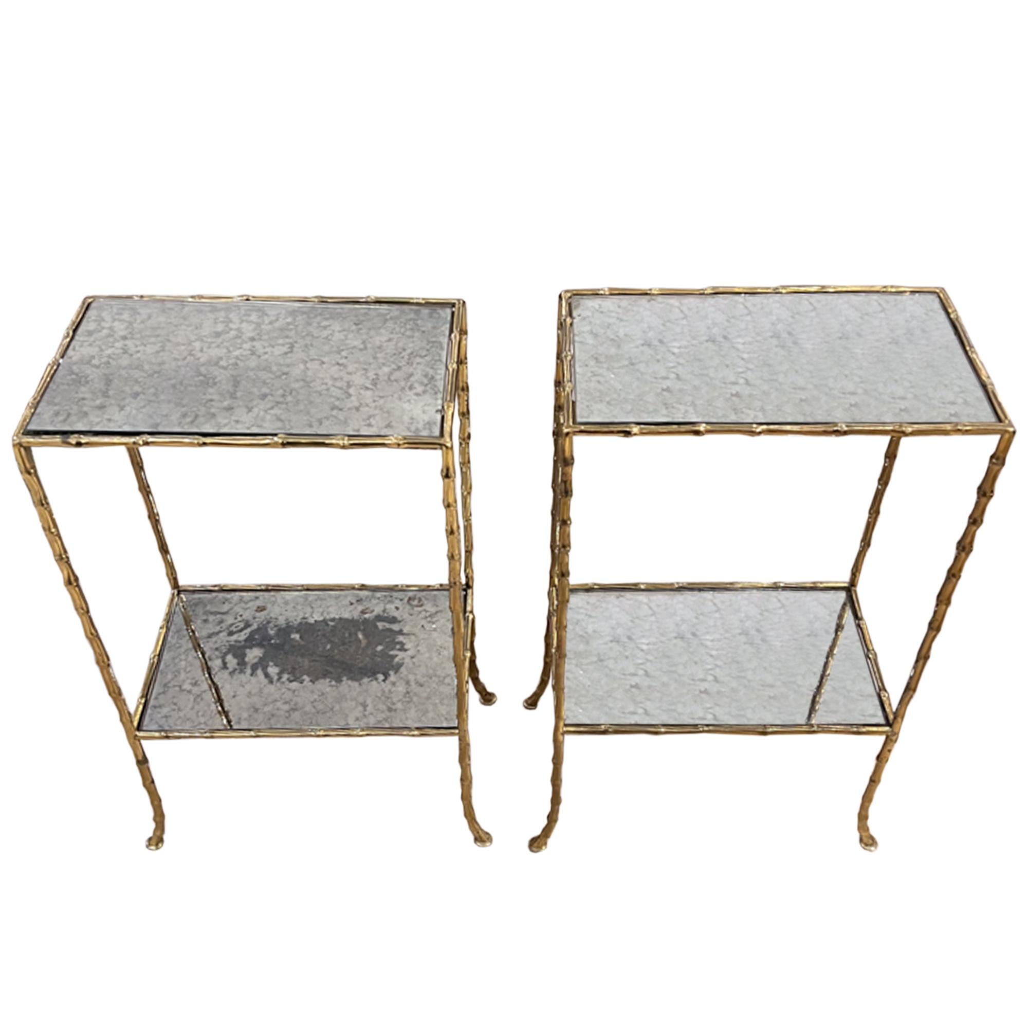 A gorgeous pair of very nice quality French 1960s side tables made from brass and eglomise glass.

A really elegant design with lovely turned out legs - delicate but sturdy!

These tables are perfect for a smaller reception room, bedroom or study.