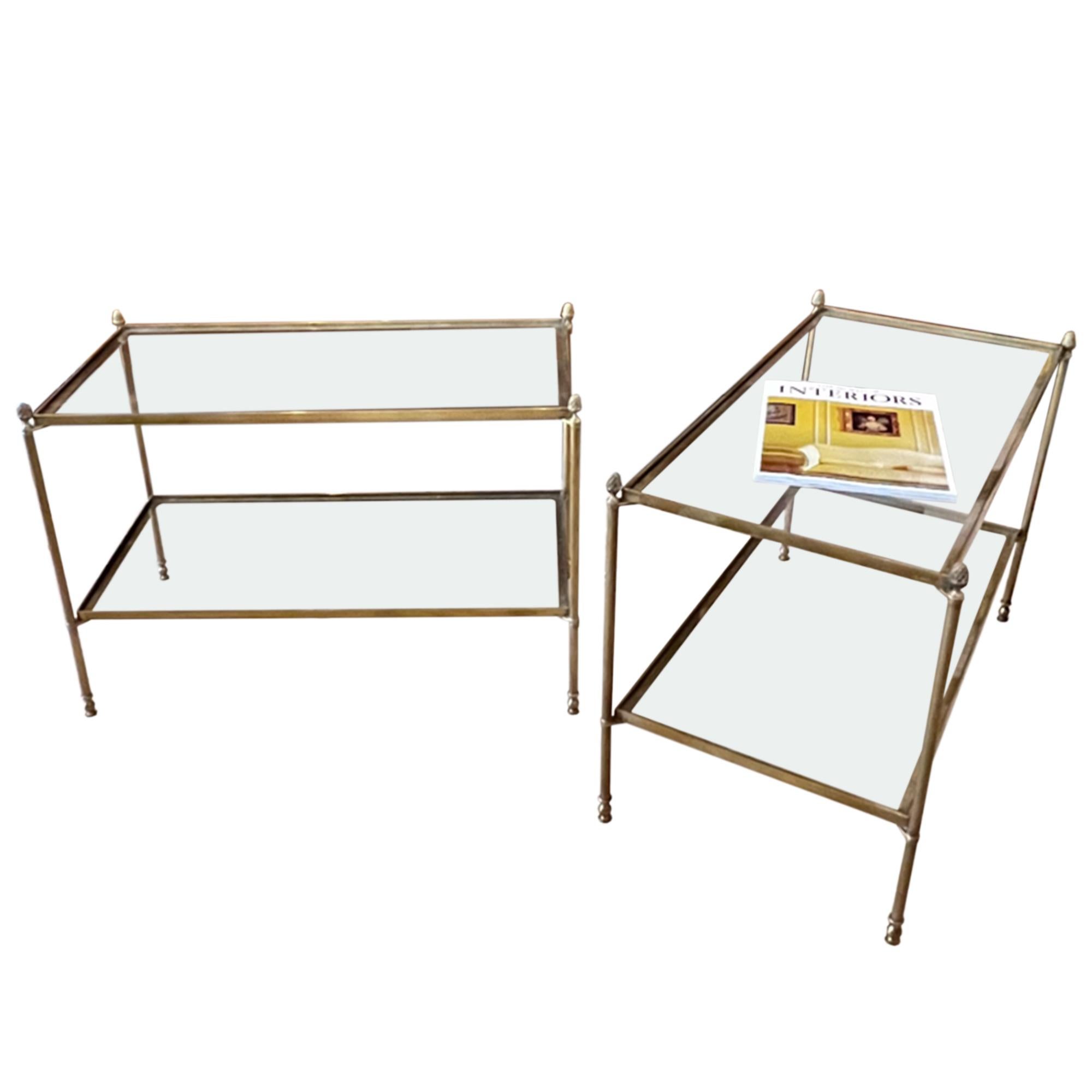 This pair of tables were made in France in the 1960s. An elegant design with reeded legs and decorated with pineapple finials. 

Please take a look at all our pictures to take a closer look. 

The height of the top shelf is 48cm and the lower shelf