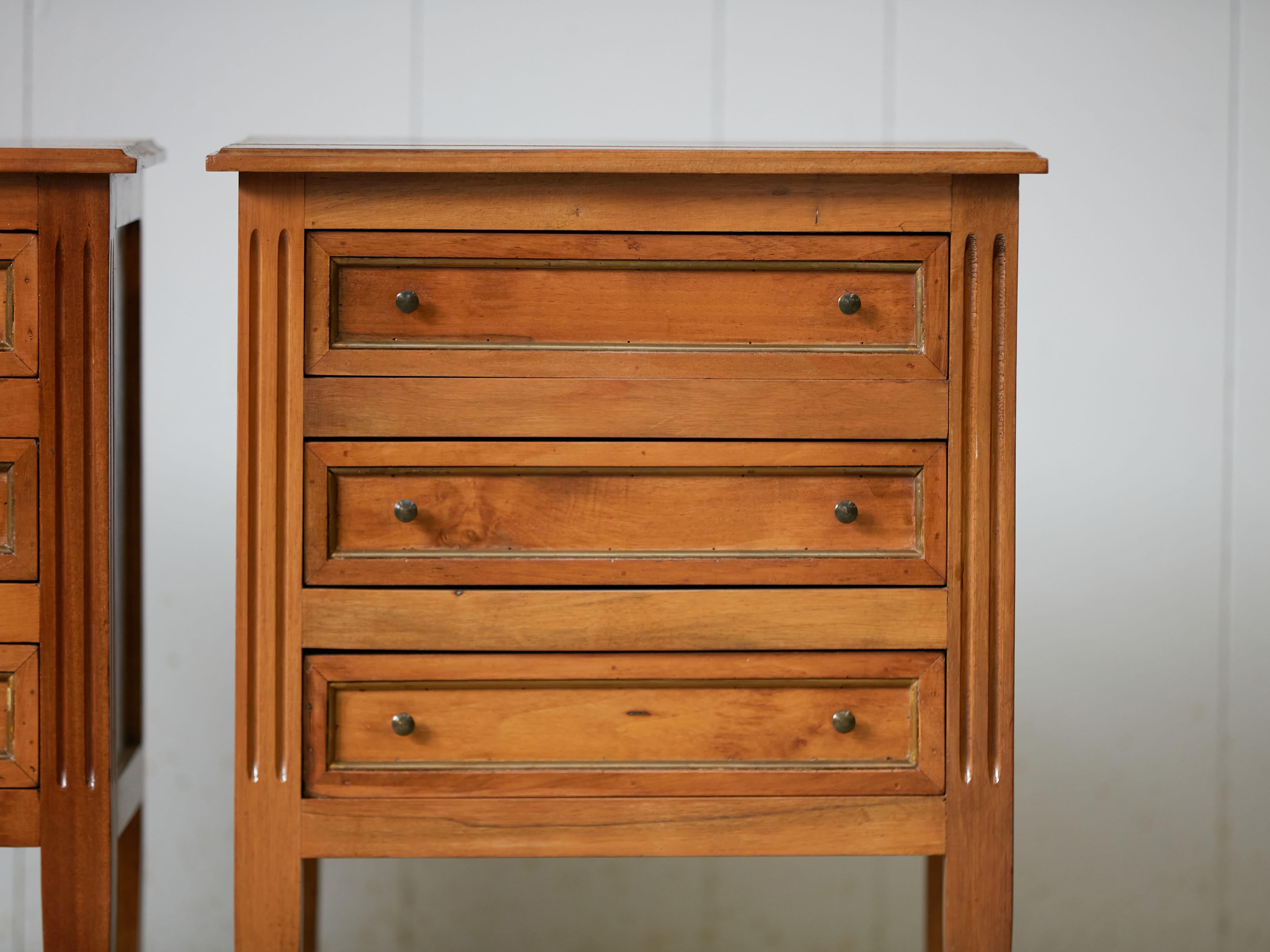 Gilt Pair of French Midcentury Three-Drawer Walnut Bedside Tables with Fluted Posts