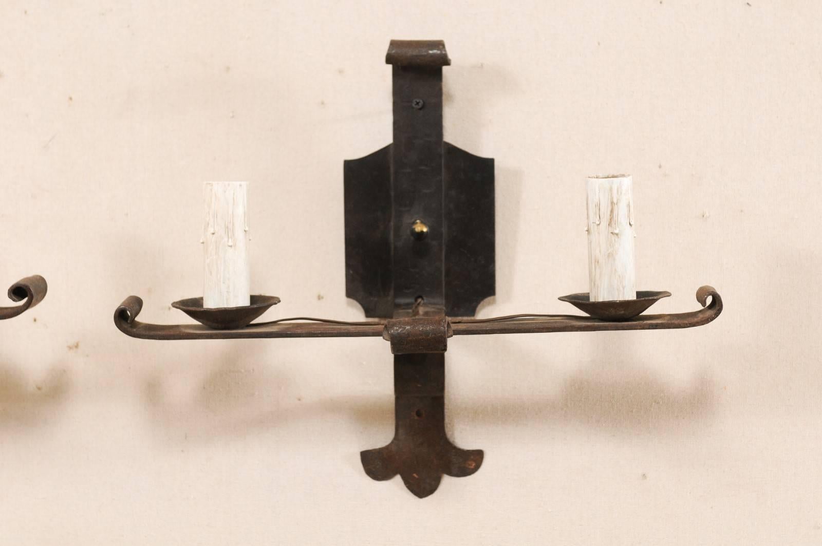 Pair of French Midcentury Two-Light Forged Iron Sconces In Good Condition In Atlanta, GA