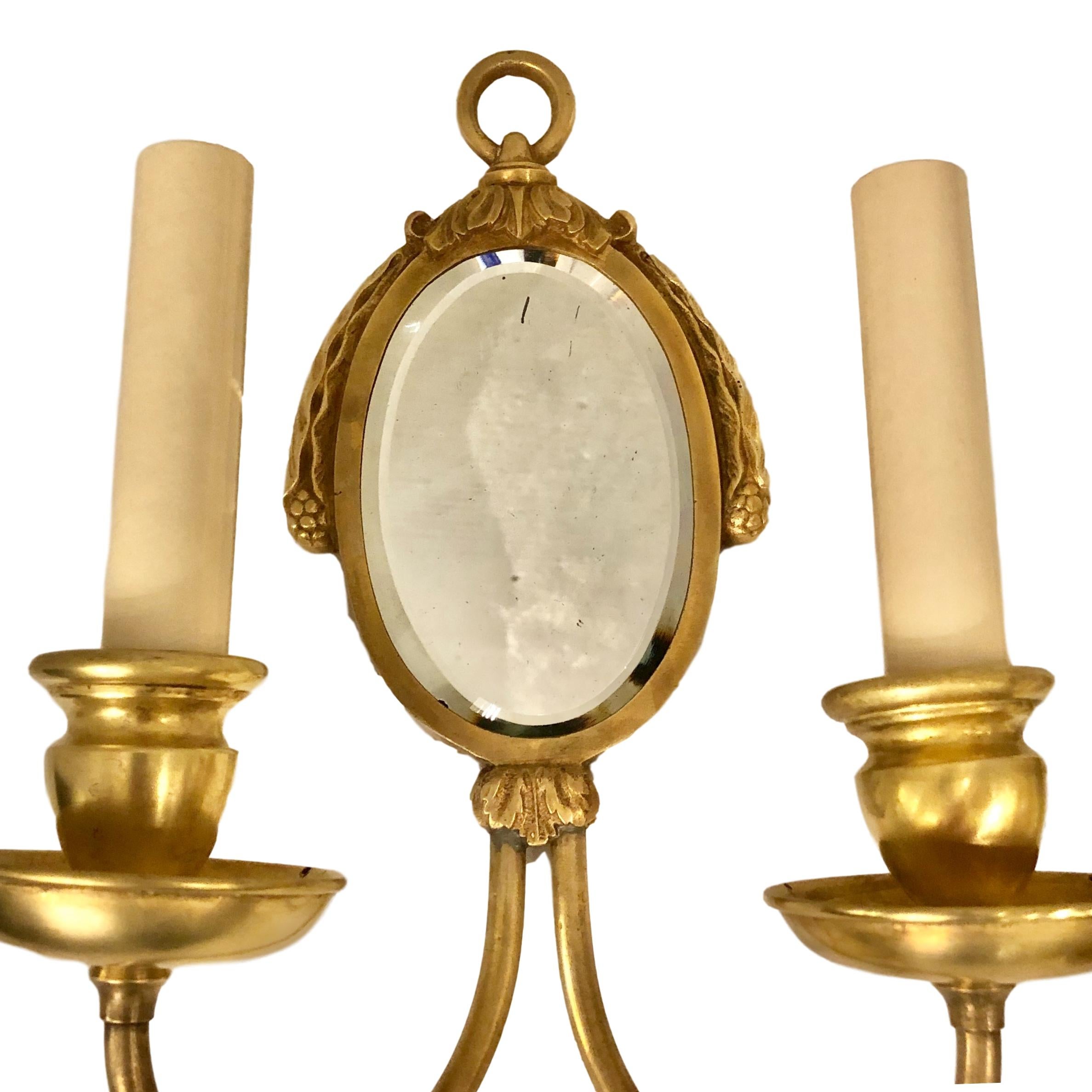 Gilt Pair of French Mirrored Sconces For Sale