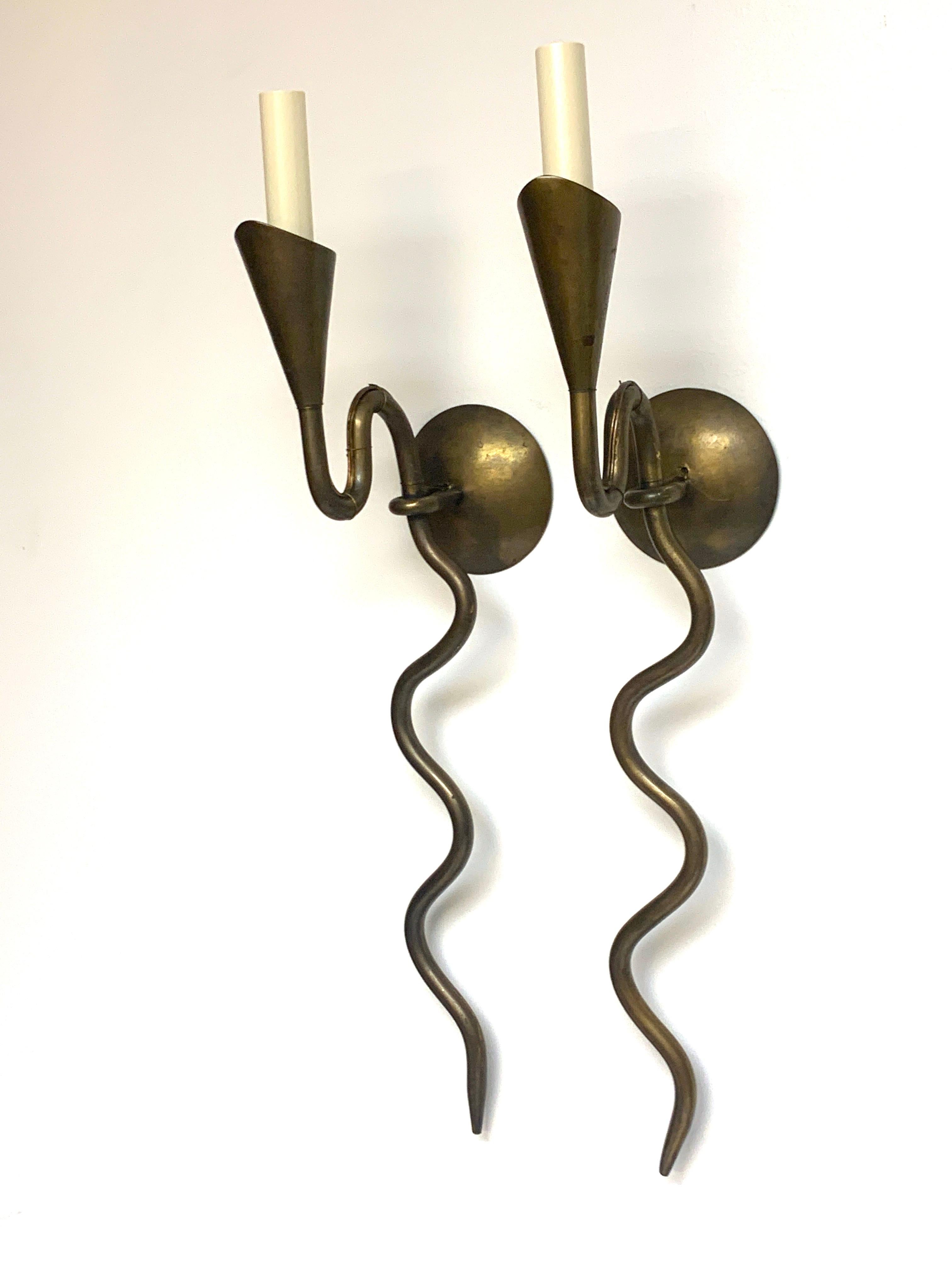 Pair of French modern bronze serpent sconces, each one fitted with one candelabra bulb, new wiring, each one stamped 