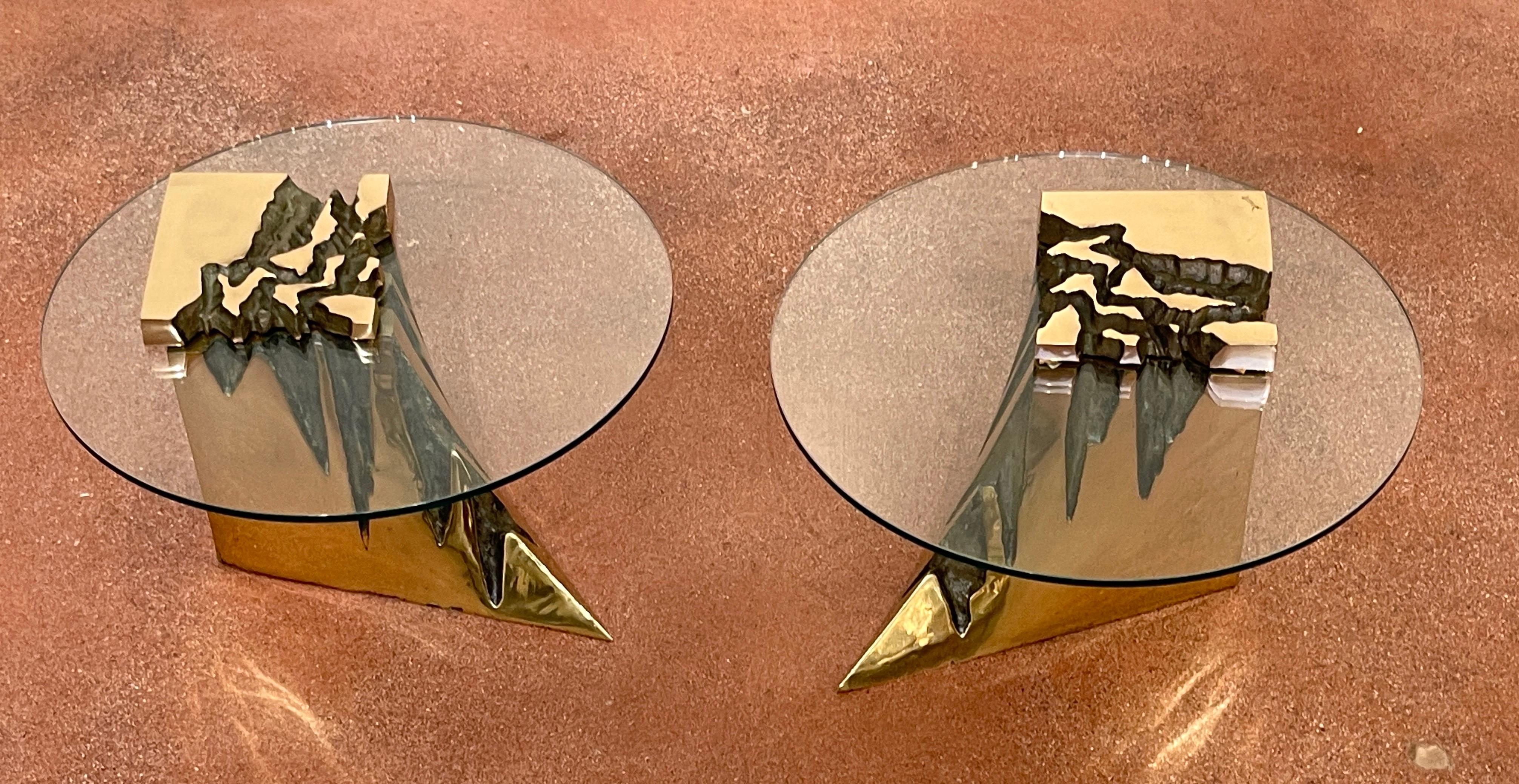 Pair of French Modern Cast Bronze Rockwork Drinks/Side Tables 
France, circa 1970s

Each one realistically solidly cast in heavy bronze, with 21-Inch circular glass tops, raised on conforming organic rockwork bases. One signed at top 'Jirrie'