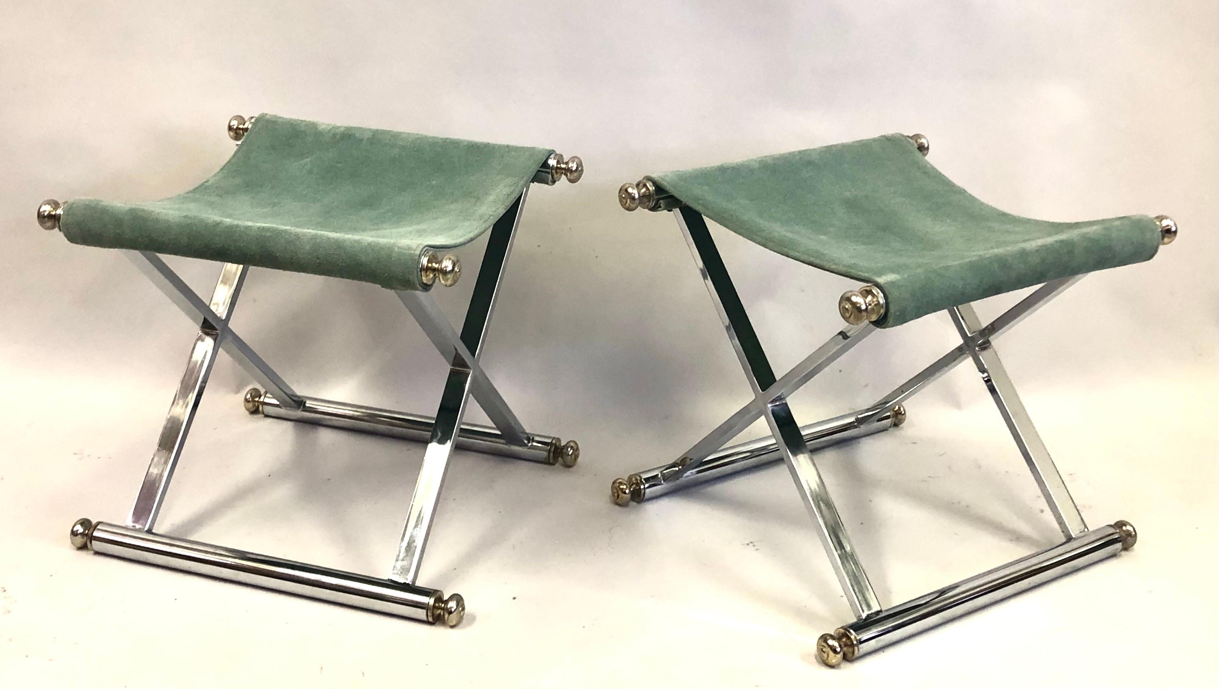 Elegant and timeless pair of French Mid-Century Modern neoclassical benches or stools in the style of Jean-Michel Frank and attributed to Hermes, circa 1970. 

The pieces are exquisitely composed of nickeled steel frames arranged in a classic,