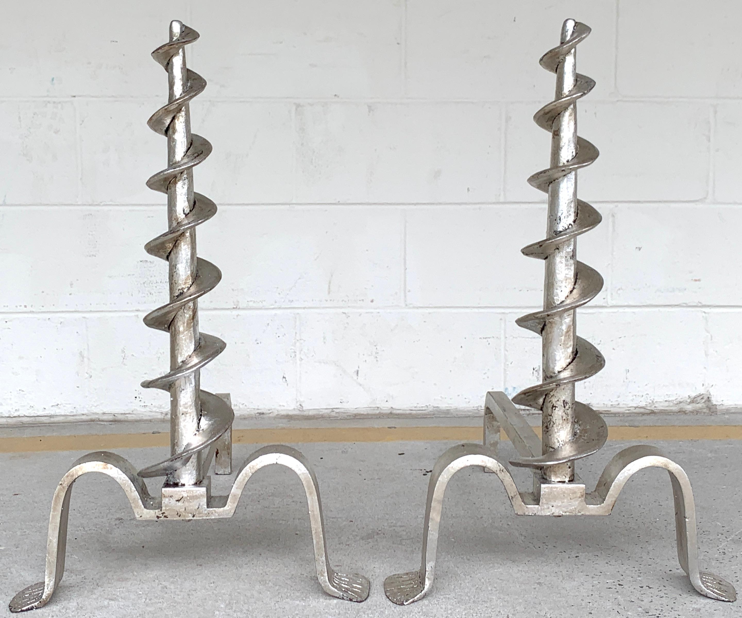 Pair of French modern silvered iron andirons, each one a tall spiral resting on elongated pad feet. Each Andiron measures 16