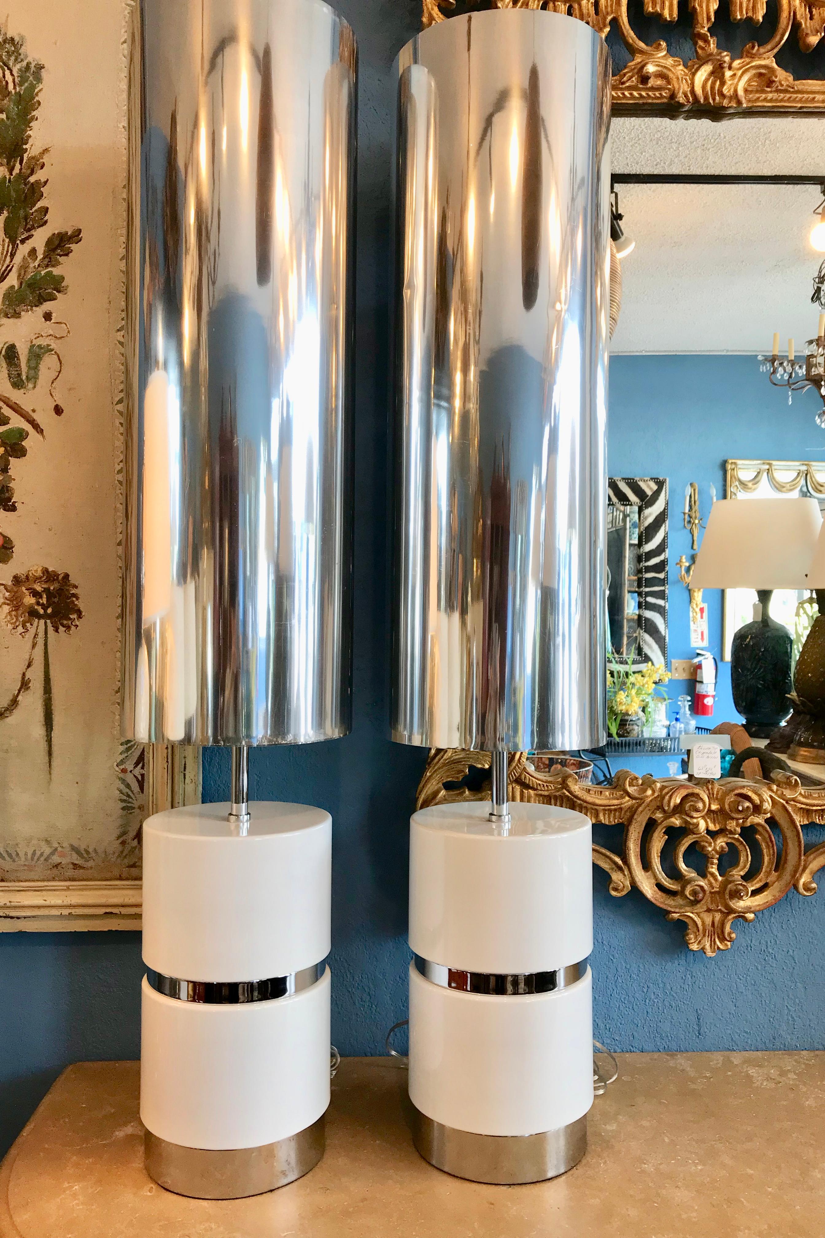 Unusual design with cylindrical porcelain bases and shimmering 