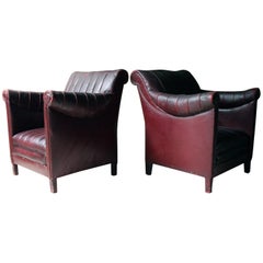 French Modernist Burgundy Rexine 
Leather Upholstered Armchairs circa 1930 Pair