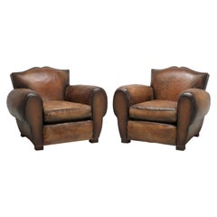 Pair of French Moustache Back Leather Club Chairs with an 80-Hour Restoration
