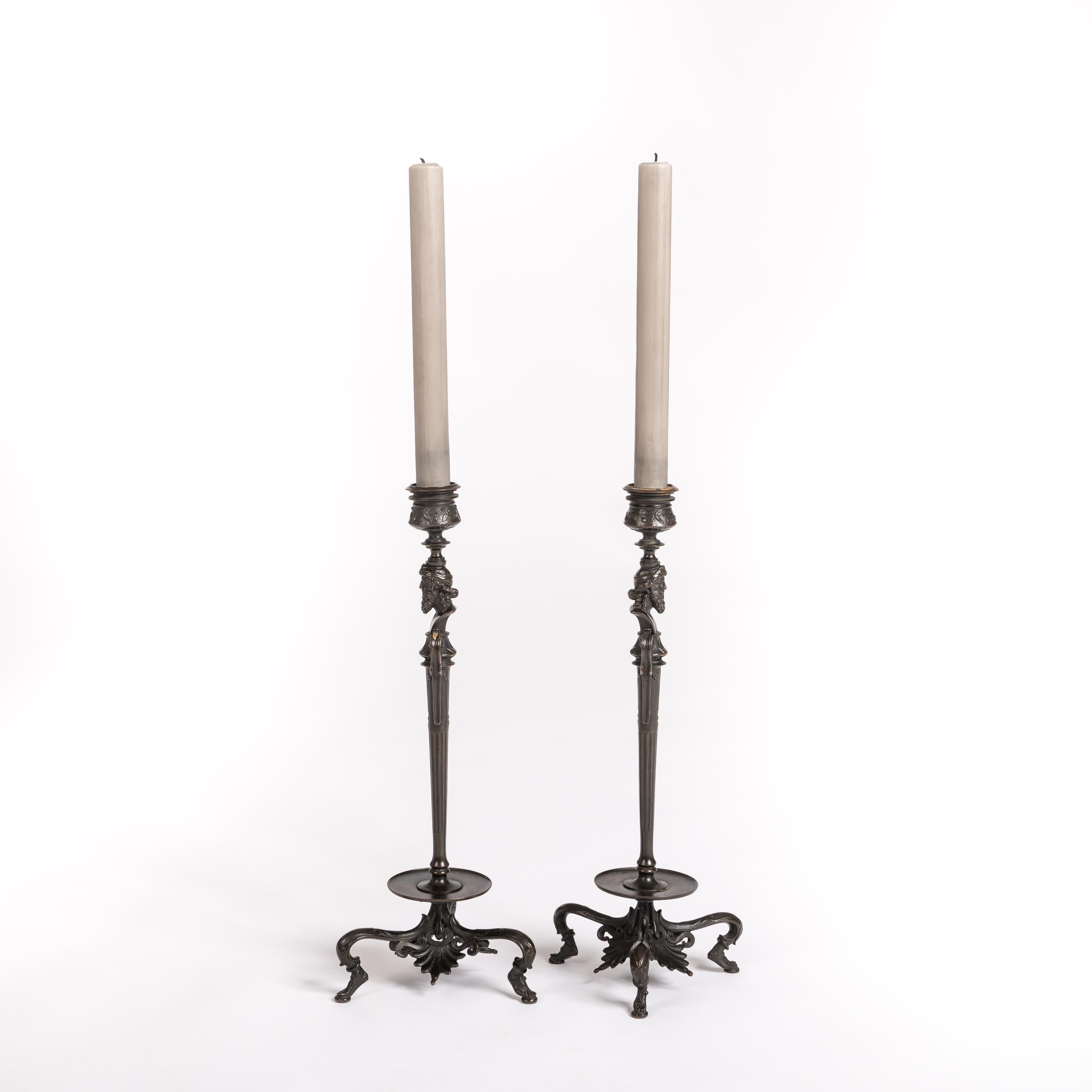 Pair of very elegant classicist candlesticks in fine patinated bronze, signed BARBEDIENNE.
The execution of the casting is extremely finely worked with delicate leaves on the outer wall of the candlestick, with a head of antiquity on the upper part