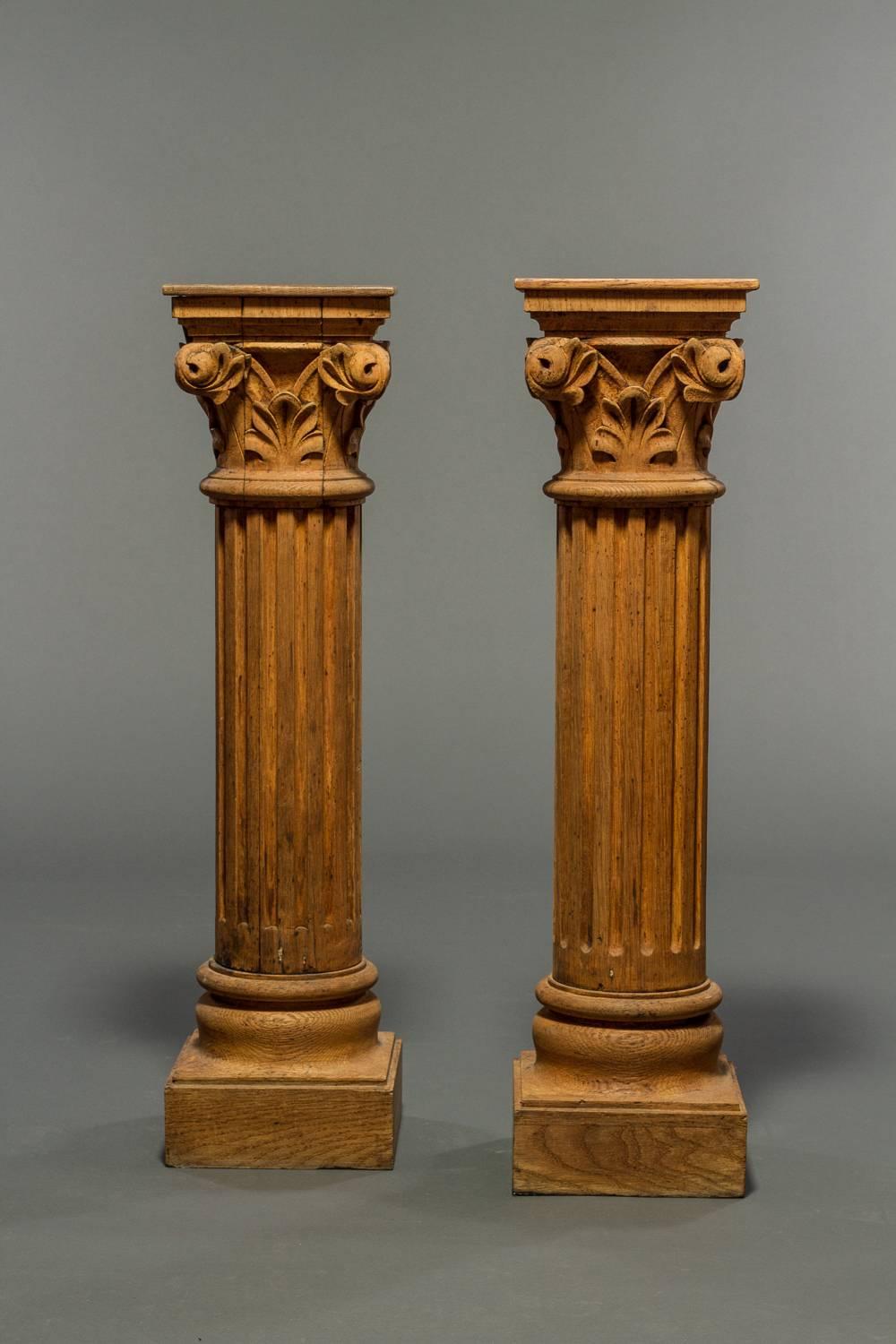 Pair of French natural wood columns. Can be used as pedestals or fitted with a tabletop.
