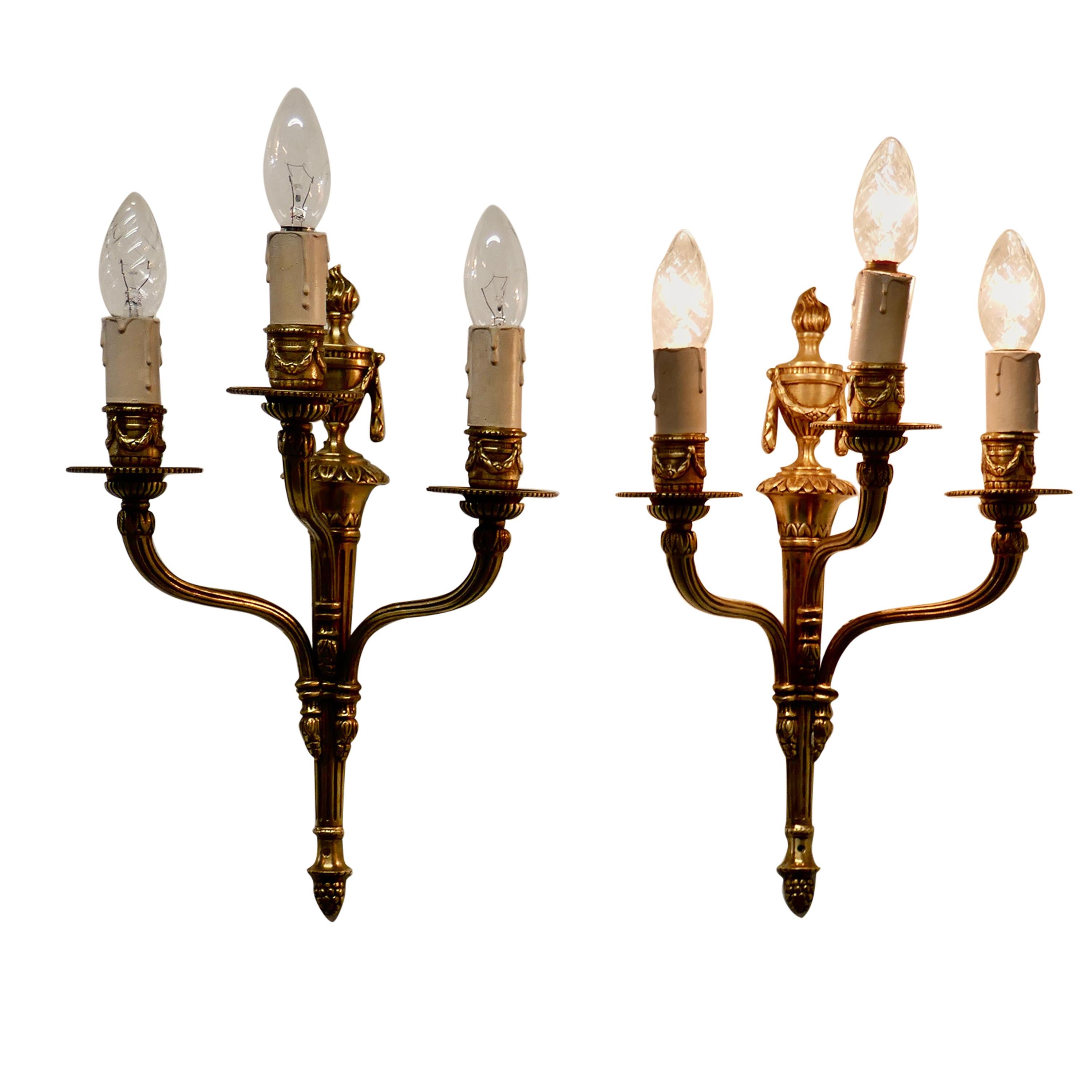 Pair of French Neoclassical Brass Triple Wall Lights