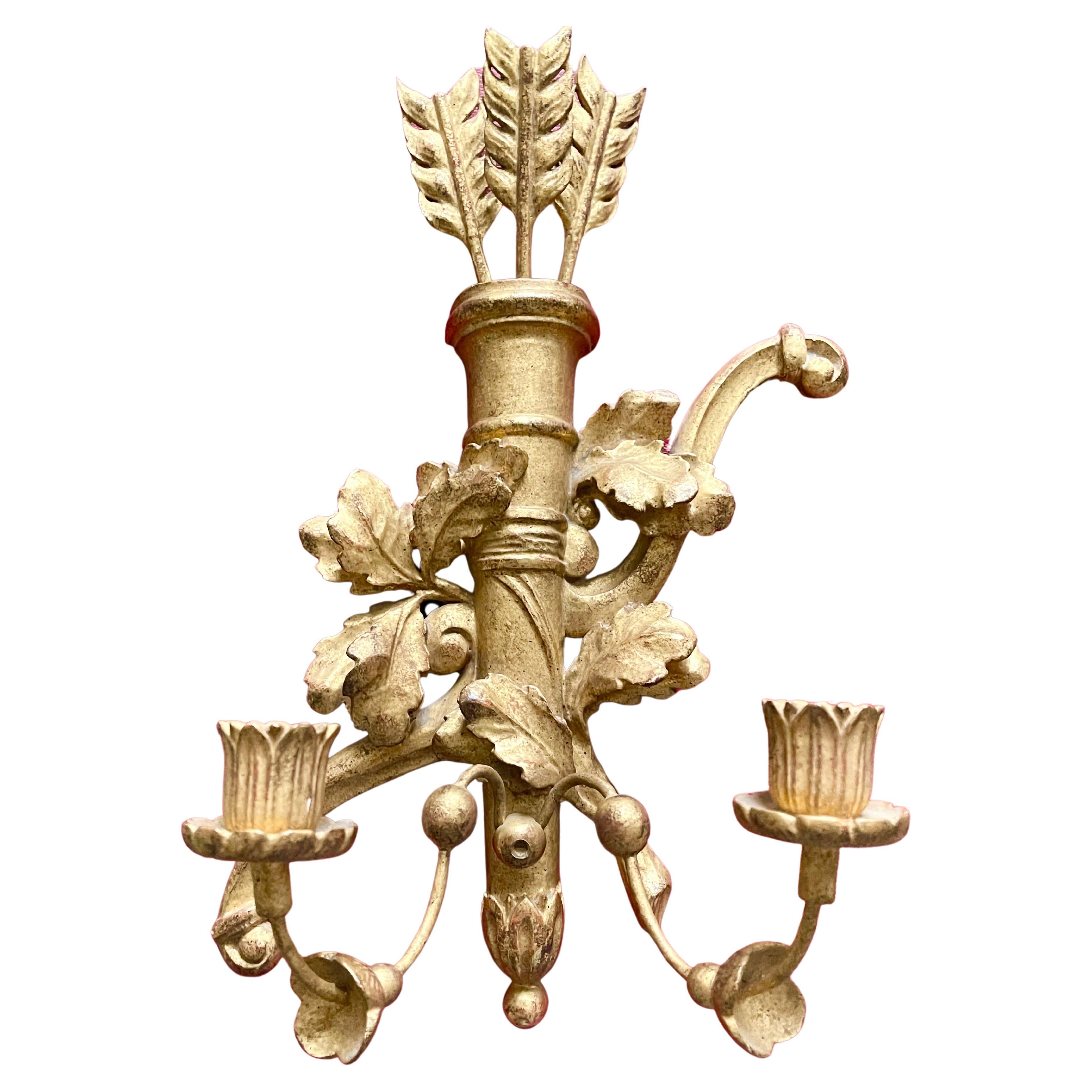 Pair of French neoclassical style hand carved giltwood wall sconces with leaves and arrows motif, 19th century, circa. 1820-1850s.




