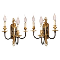 Pair of French Neoclassical 3-Arm Wall Sconces in Patinated and 24k Gilt Bronze
