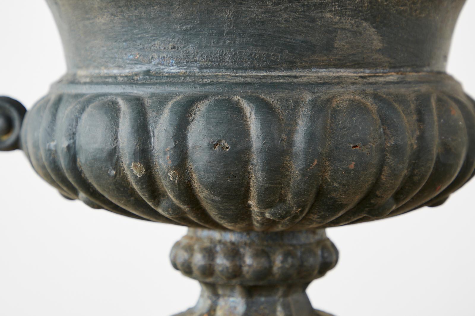 Pair of French Neoclassical Cast Iron Urns on Pedestals 8