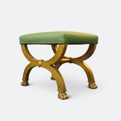 Pair of French Neoclassical Gilded Stools with Lion Paws