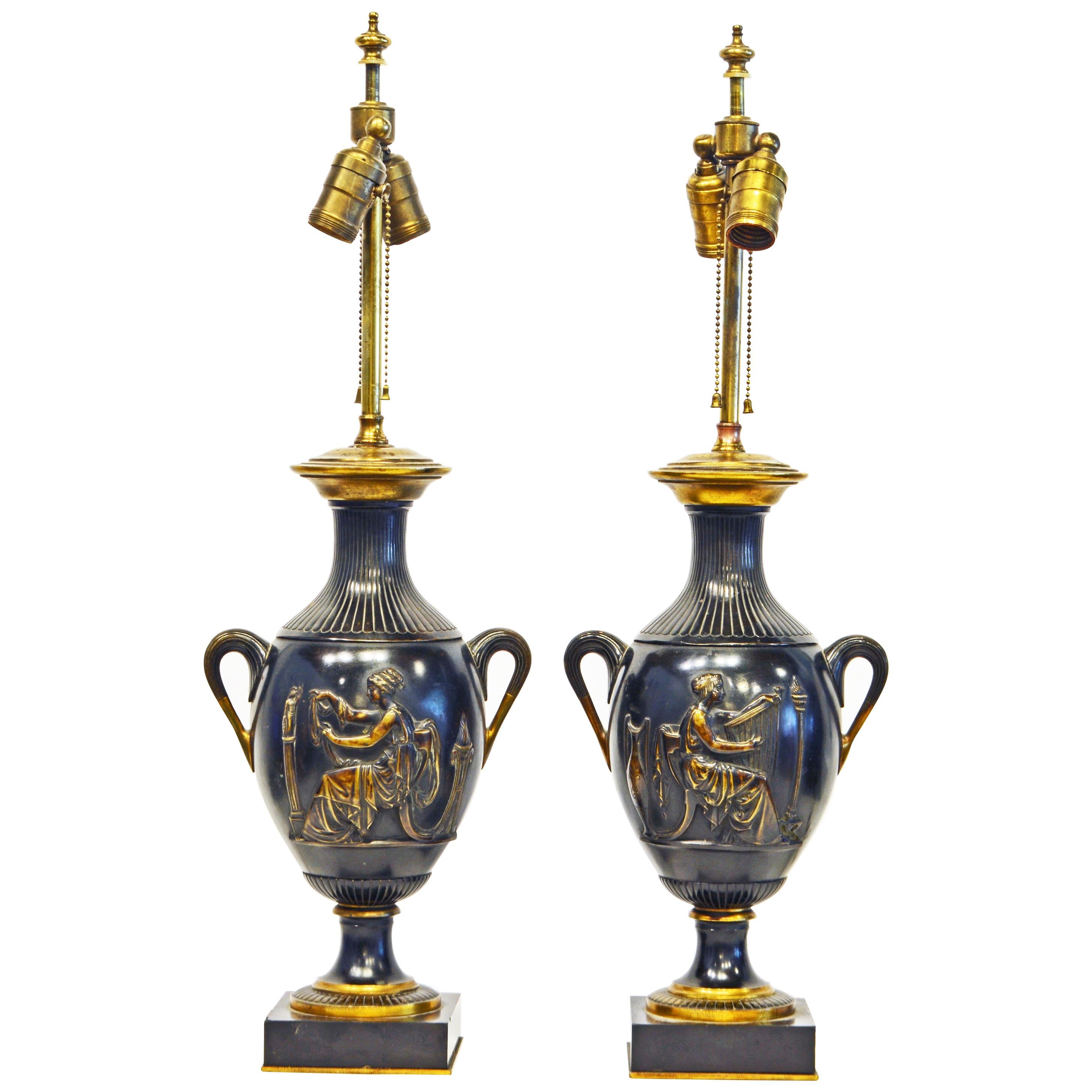 Pair of French Neoclassical Haut-Relief Decorated Patinated Bronze Table Lamps For Sale