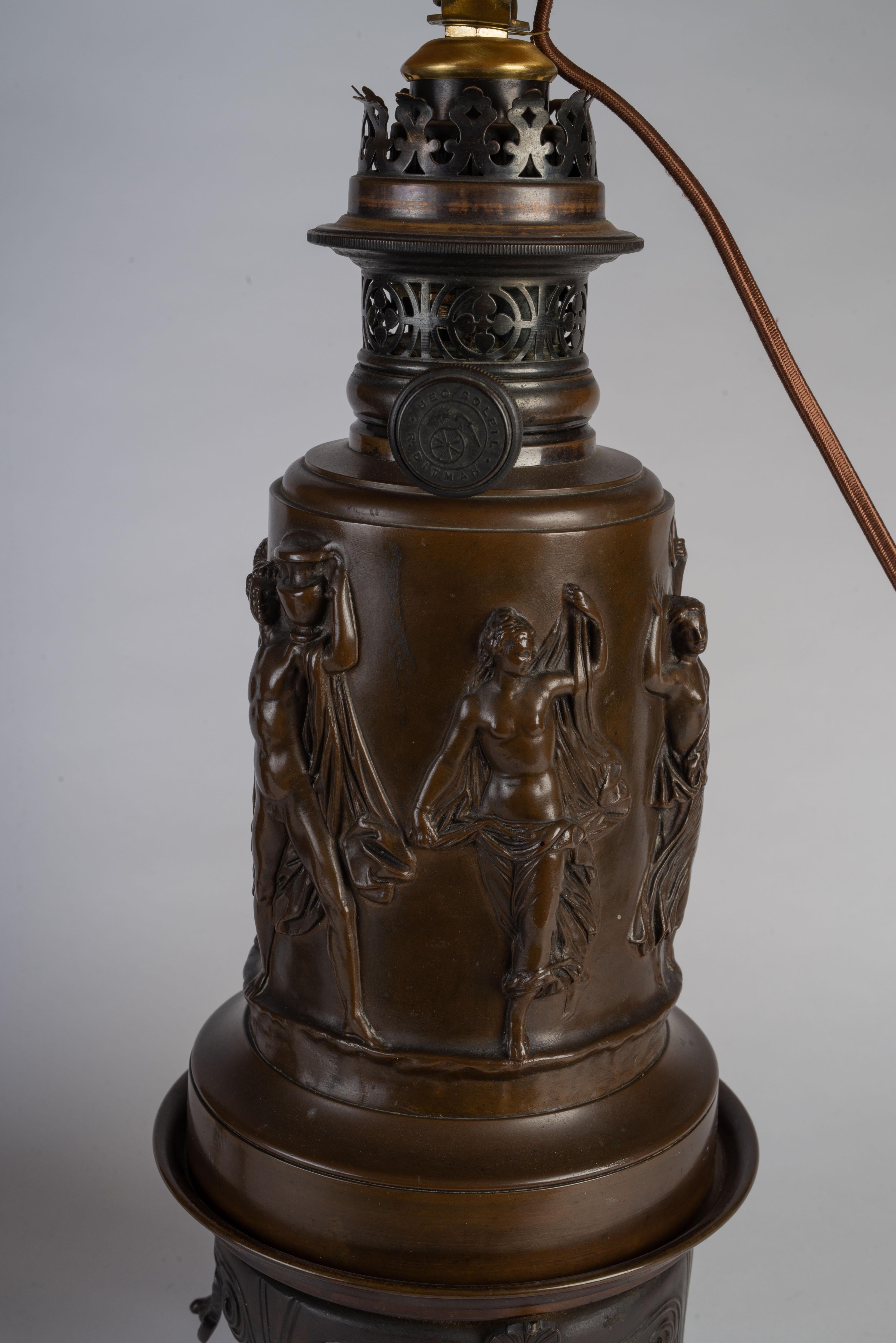 Each cast with neoclassical figures, on separate stands, each impressed Bec Boleil, R.D. Ditmar. Electrified.
With a Sotheby’s New York provenance.

Measures: Height of base only is 14.5in.