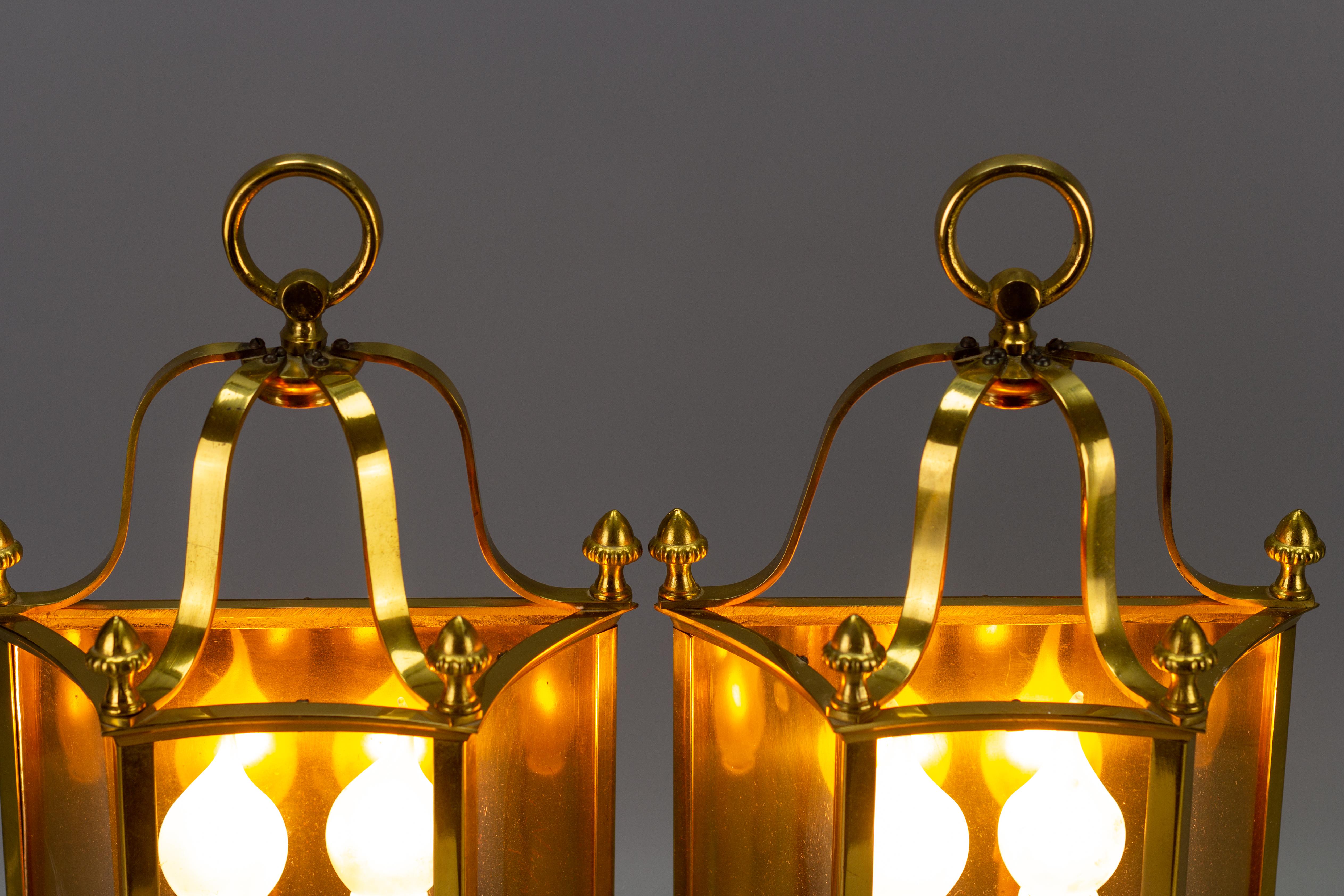 Mid-20th Century Pair of French Neoclassical Style Brass and Glass Two-Light Wall Lanterns For Sale