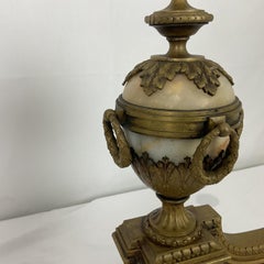 Pair of French Neoclassical Style Bronze Andirons with Urn Finials and Onyx