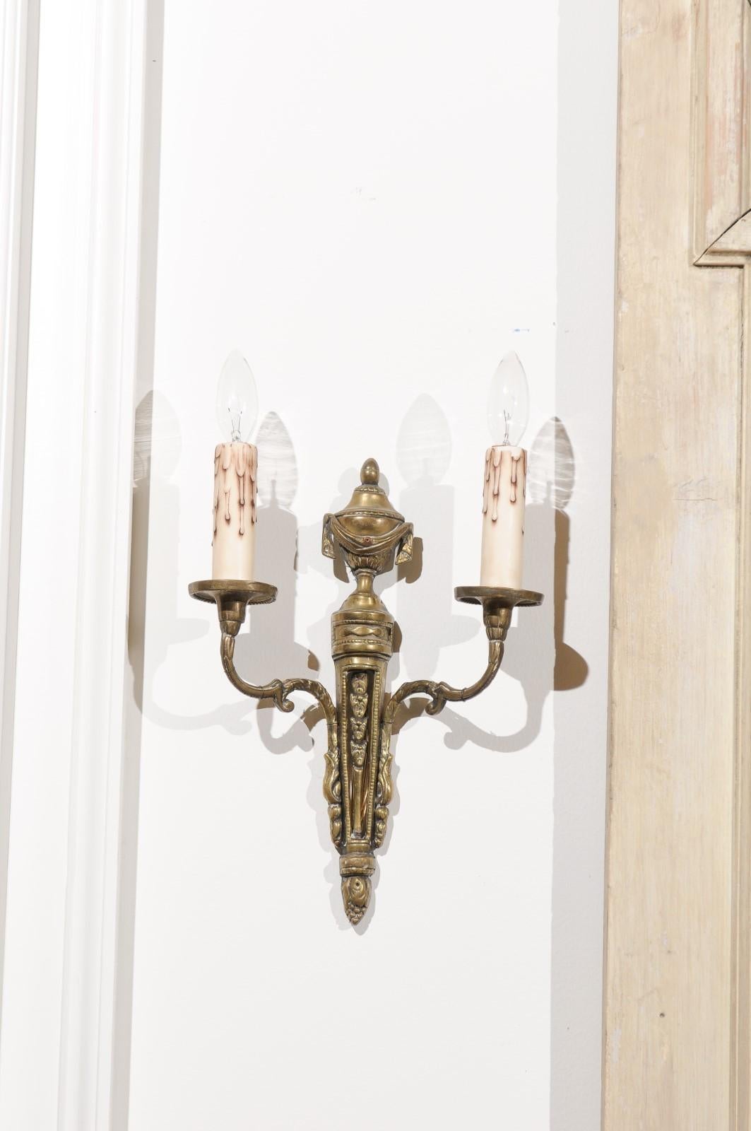 19th Century Pair of French Neoclassical Style Bronze Two-Arm Sconces with Draped Urn Finials