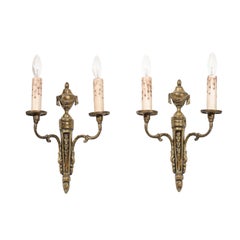 Pair of French Neoclassical Style Bronze Two-Arm Sconces with Draped Urn Finials