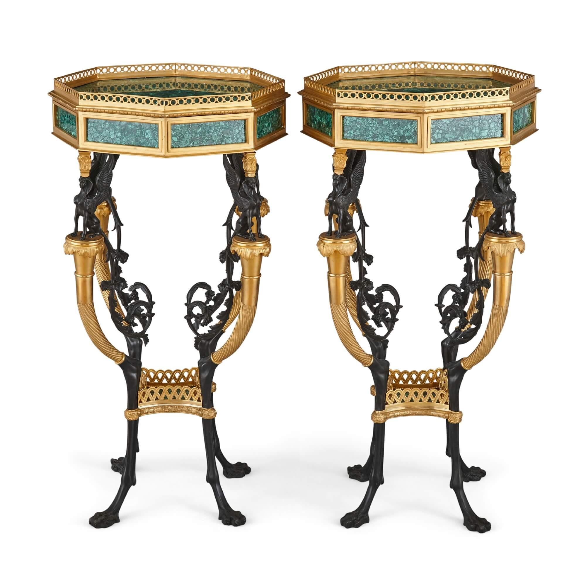 Pair of French neoclassical style malachite and gilt bronze side tables
French, 20th century
Dimensions: Height 85cm, diameter 50cm

These striking octagonal guéridons are crafted from malachite, ormolu, and patinated bronze. Designed in the