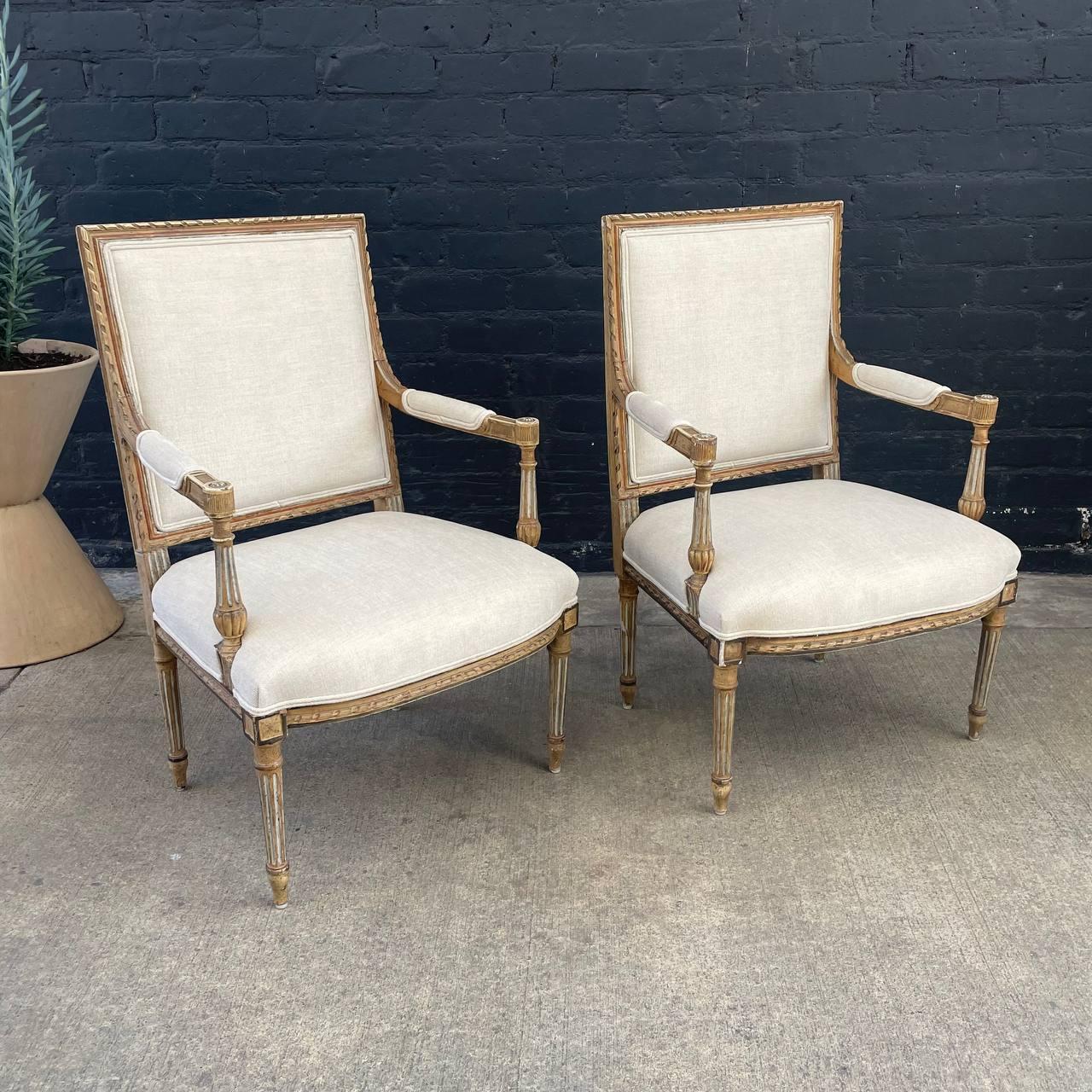 Pair Of French Neoclassical-Style Painted Armchairs 

Country: France 
Materials: Carved-wood, New Fabric
Condition: Newly Reupholstered, Distress Wood
Style: French Neoclassical
Year: 1940’s

Dimensions:
38”H x 24”W x 24”D
Seat Height 17.50”