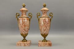 Pair of French Neoclassical Style Pink Marble Urns with Bronze Mounts, ca 1920