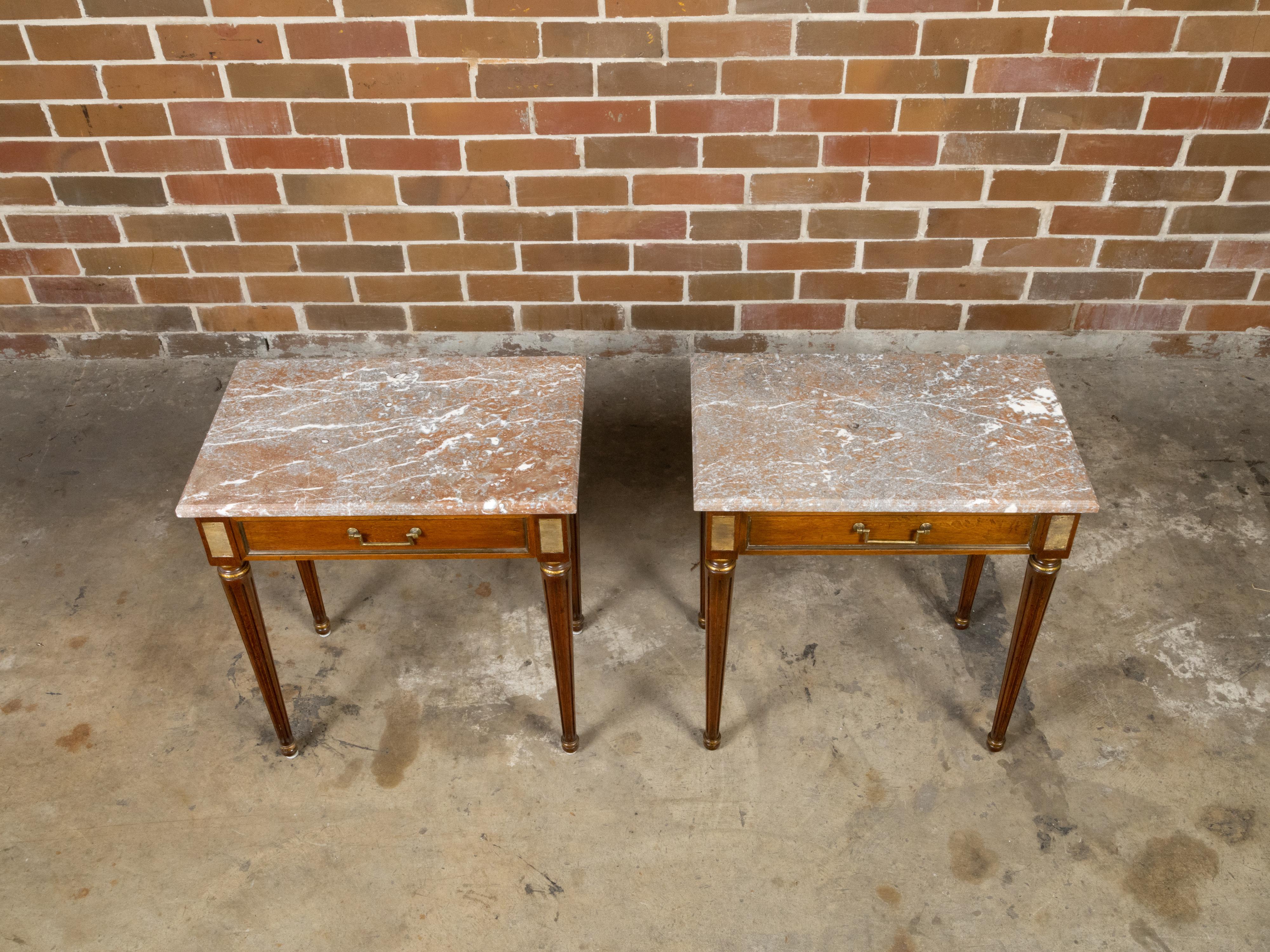 Gilt Pair of French Neoclassical Style Walnut Console Tables with Marble Tops For Sale