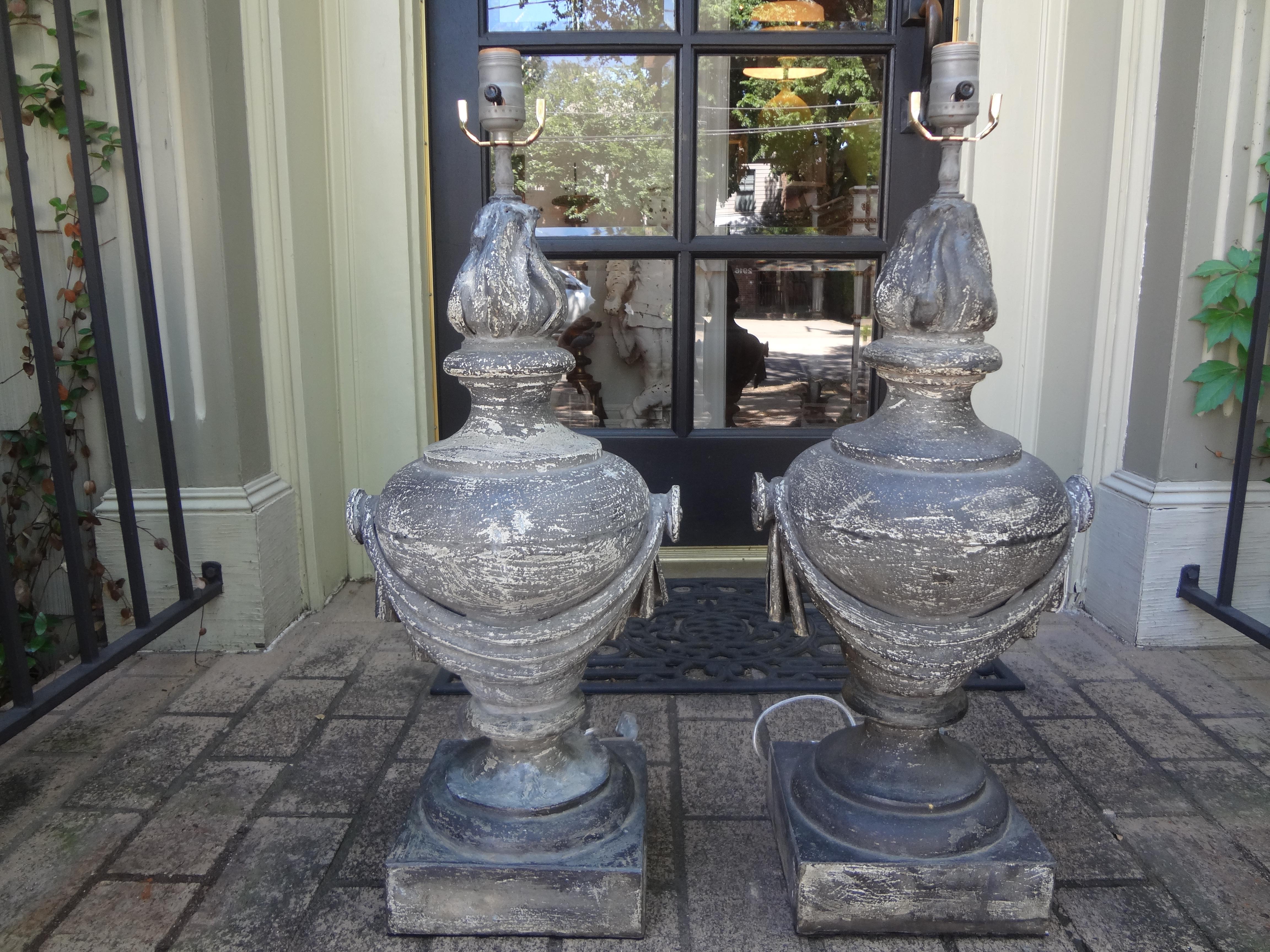 Pair of French neoclassical style zinc lamps.
Stunning large pair of French Neoclassical style zinc lamps. These French zinc lamps have a draped design terminating in side medallions. Our zinc lamps have been newly wired to U.S. specifications with