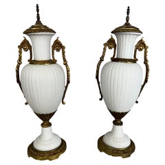 Pair of French Neoclassical White Bisque Porcelain & Gilt Bronze Ormolu Urns