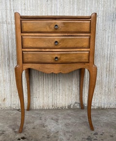 Pair of French Nightstands with Three Drawers and Carbriole Legs